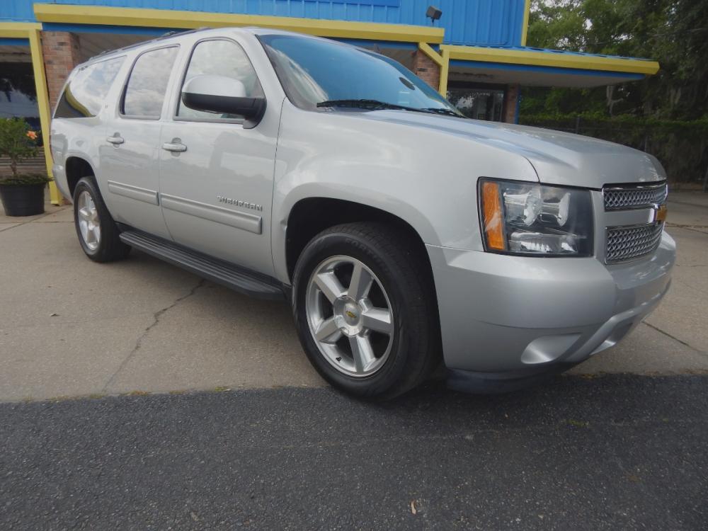 2013 Silver Metallic /Gray Leather Chevrolet Suburban LT 1500 2WD (1GNSCJE03DR) with an 5.3L V8 OHV 16V FFV engine, 6-Speed Automatic transmission, located at 3120 W Tennessee St, Tallahassee, FL, 32304-1002, (850) 575-6702, 30.458841, -84.349648 - Used Car Supermarket is proud to present you with this loaded immaculate 2013 Chevy Suburban LT with Navigation, sunroof and leather. Used Car Supermarket prides itself in offering you the finest pre-owned vehicle in Tallahassee. Used Car Supermarket has been locally family owned and operated for ov - Photo #0