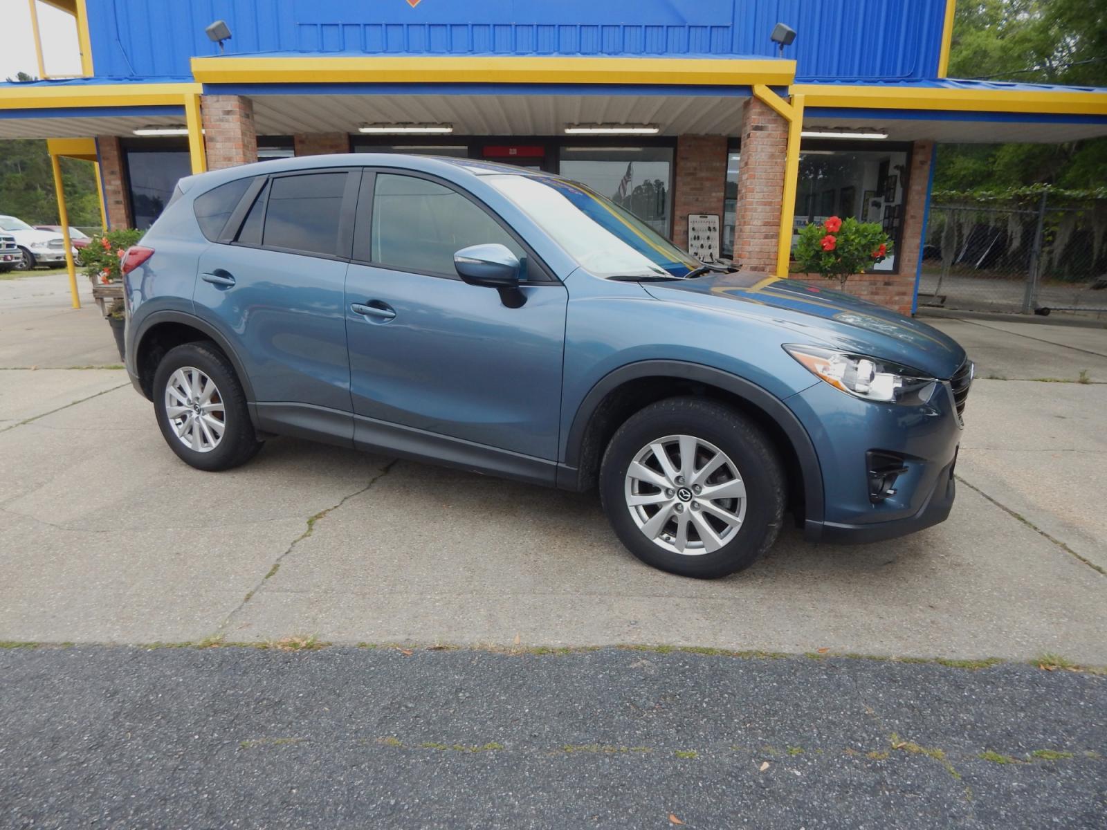 2016 /Charcoal Mazda CX-5 Touring (JM3KE2CY7G0) with an 2.5L L4 DOHC 16V engine, 6-Speed Automatic transmission, located at 3120 W Tennessee St, Tallahassee, FL, 32304-1002, (850) 575-6702, 30.458841, -84.349648 - Used Car Supermarket is proud to present you with this loaded immaculate 2016 Mazda CX-5 Touring. Used Car Supermarket prides itself in offering you the finest pre-owned vehicle in Tallahassee. Used Car Supermarket has been locally family owned and operated for over 48 years. Our CX-5 Touring has be - Photo #0
