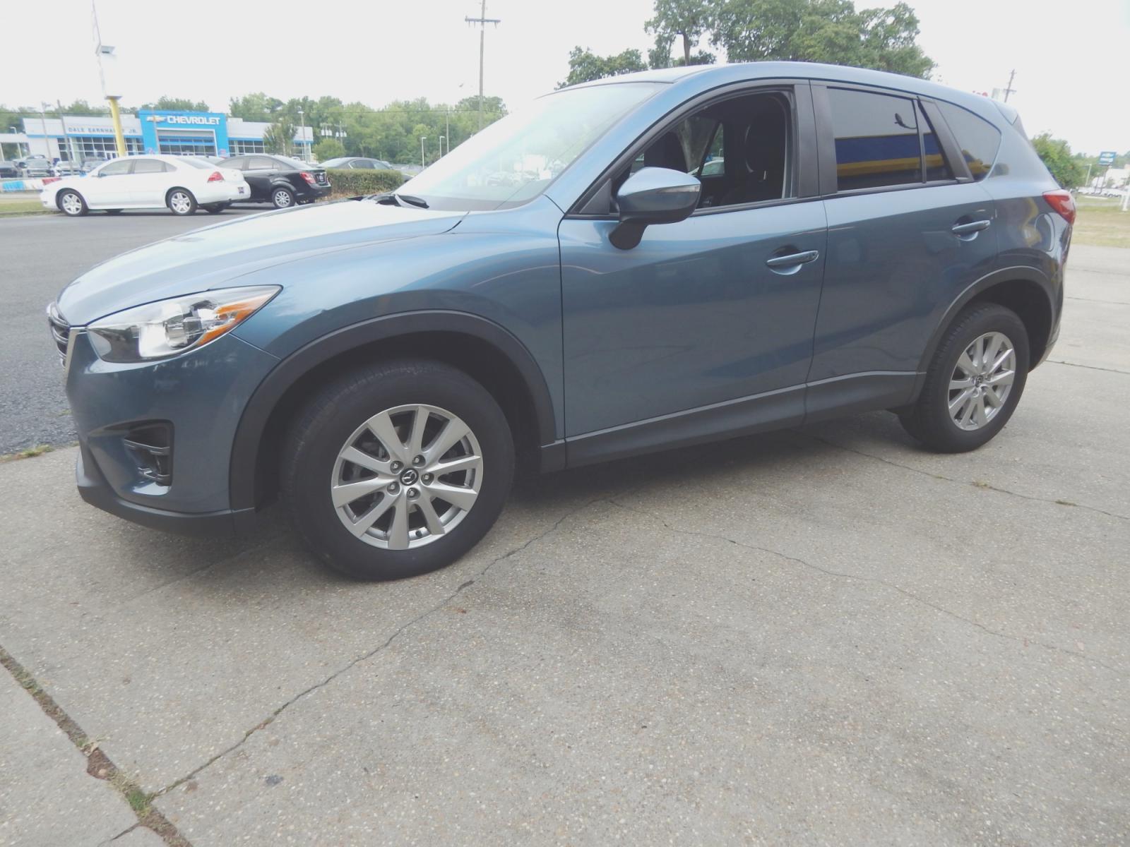 2016 /Charcoal Mazda CX-5 Touring (JM3KE2CY7G0) with an 2.5L L4 DOHC 16V engine, 6-Speed Automatic transmission, located at 3120 W Tennessee St, Tallahassee, FL, 32304-1002, (850) 575-6702, 30.458841, -84.349648 - Photo #1