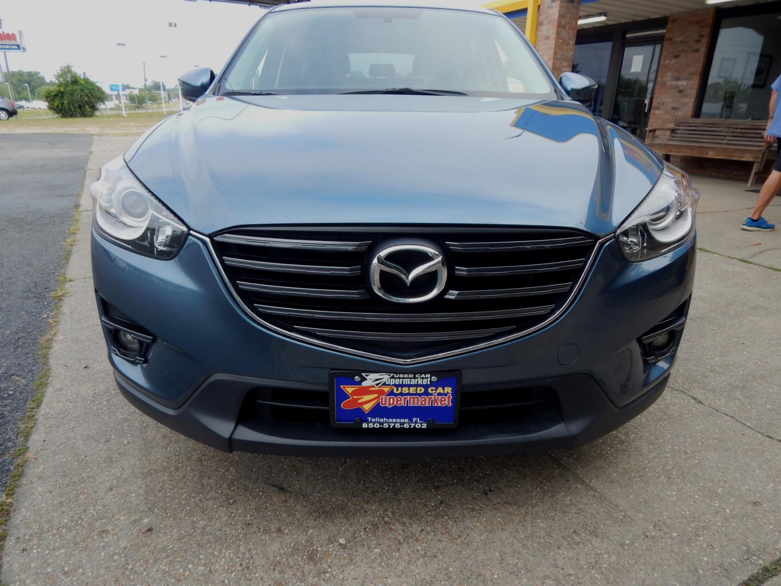 2016 /Charcoal Mazda CX-5 Touring (JM3KE2CY7G0) with an 2.5L L4 DOHC 16V engine, 6-Speed Automatic transmission, located at 3120 W Tennessee St, Tallahassee, FL, 32304-1002, (850) 575-6702, 30.458841, -84.349648 - Photo #2