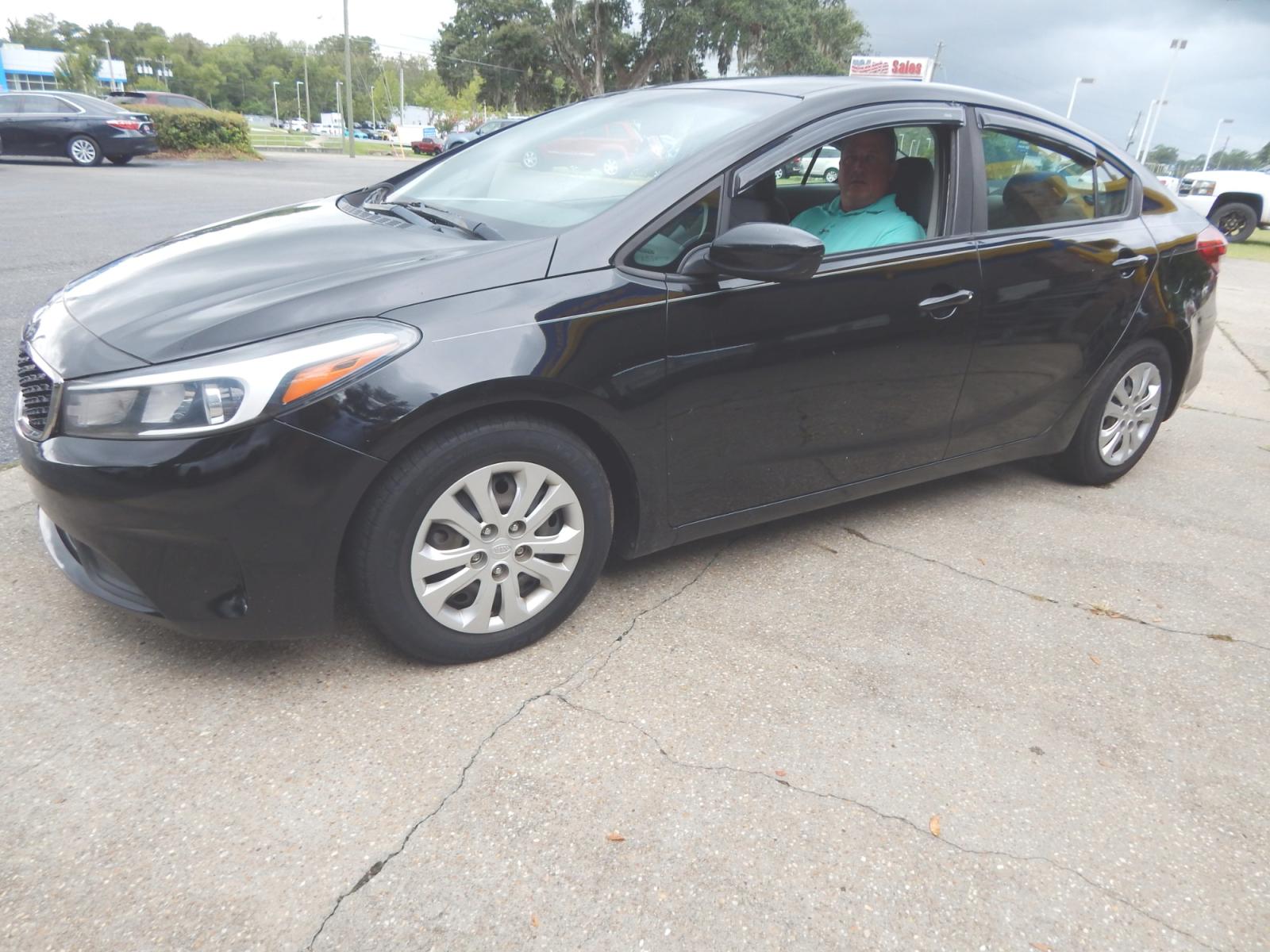 2017 Black /Gray Kia Forte LX Sedan (3KPFK4A77HE) with an 2.0L L4 DOHC 16V engine, Automatic transmission, located at 3120 W Tennessee St, Tallahassee, FL, 32304-1002, (850) 575-6702, 30.458841, -84.349648 - Used Car Supermarket is proud to present you with this loaded immaculate 2017 Kia Forte LX Sedan. Used Car Supermarket prides itself in offering you the finest pre-owned vehicle in Tallahassee. Used Car Supermarket has been locally family owned and operated for over 48 years. Our Forte LX has been s - Photo #1
