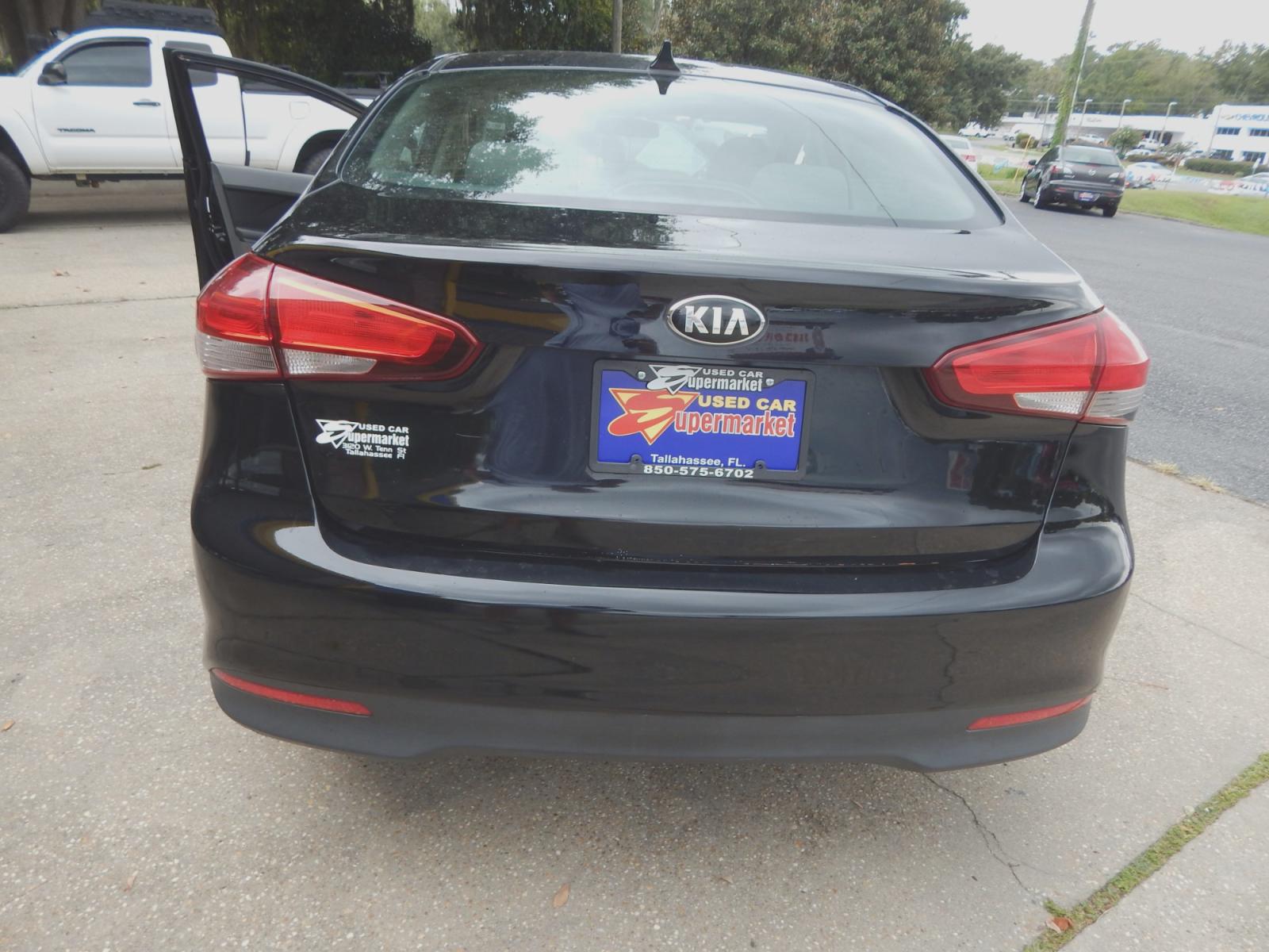 2017 Black /Gray Kia Forte LX Sedan (3KPFK4A77HE) with an 2.0L L4 DOHC 16V engine, Automatic transmission, located at 3120 W Tennessee St, Tallahassee, FL, 32304-1002, (850) 575-6702, 30.458841, -84.349648 - Used Car Supermarket is proud to present you with this loaded immaculate 2017 Kia Forte LX Sedan. Used Car Supermarket prides itself in offering you the finest pre-owned vehicle in Tallahassee. Used Car Supermarket has been locally family owned and operated for over 48 years. Our Forte LX has been s - Photo #3