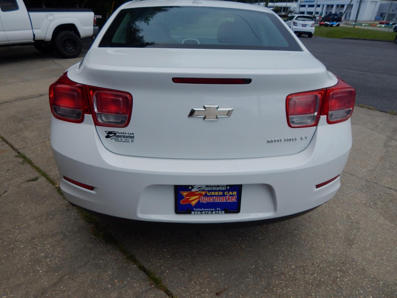 2014 White /Charcoal Chevrolet Malibu 1LT (1G11C5SL6EF) with an 2.5L L4 DOHC 16V engine, 6-Speed Automatic transmission, located at 3120 W Tennessee St, Tallahassee, FL, 32304-1002, (850) 575-6702, 30.458841, -84.349648 - Used Car Supermarket is proud to present you with this loaded immaculate 2014 Chevy Malibu LT with low miles. Used Car Supermarket prides itself in offering you the finest pre-owned vehicle in Tallahassee. Used Car Supermarket has been locally family owned and operated for over 48 years. Our Malibu - Photo #3