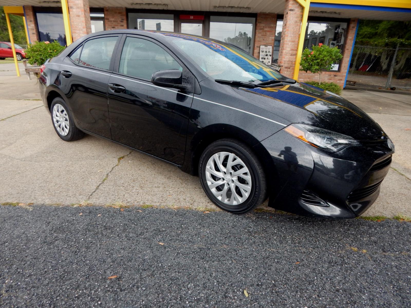 2018 Black /Charcoal Toyota Corolla LE (5YFBURHE8JP) with an 1.8L L4 DOHC 16V engine, Automatic transmission, located at 3120 W Tennessee St, Tallahassee, FL, 32304-1002, (850) 575-6702, 30.458841, -84.349648 - Photo #0