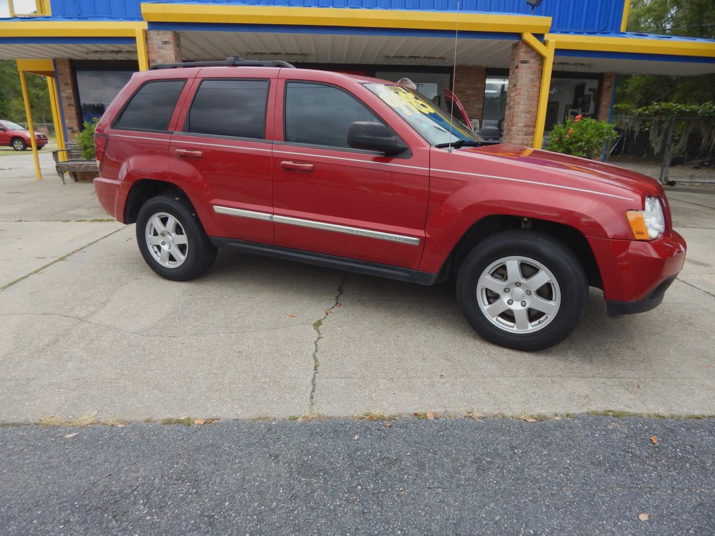 2010 Maroon /Gray Jeep Grand Cherokee Laredo 2WD (1J4PS4GK6AC) with an 3.7L V6 SOHC 12V engine, 5-Speed Automatic transmission, located at 3120 W Tennessee St, Tallahassee, FL, 32304-1002, (850) 575-6702, 30.458841, -84.349648 - Used Car Supermarket is proud to present you with this loaded immaculate 2010 Jeep Grand Cherokee Laredo with low miles. Used Car Supermarket prides itself in offering you the finest pre-owned vehicle in Tallahassee. Used Car Supermarket has been locally family owned and operated for over 48 years. - Photo#0