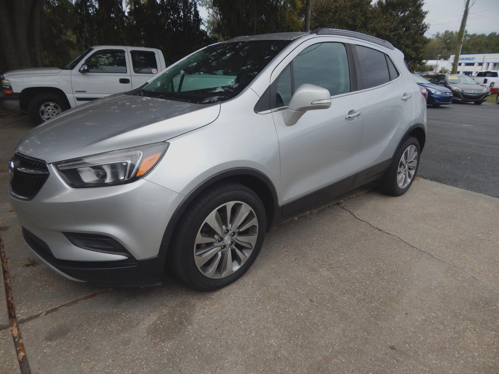 2018 Silver Metallic /Charcoal Buick Encore Preferred FWD (KL4CJASB1JB) with an 1.4L L4 DOHC 16V TURBO engine, Automatic transmission, located at 3120 W Tennessee St, Tallahassee, FL, 32304-1002, (850) 575-6702, 30.458841, -84.349648 - Used Car Supermarket is proud to present you with this loaded immaculate 2018 Buick Encore Preferred Package. Used Car Supermarket prides itself in offering you the finest pre-owned vehicle in Tallahassee. Used Car Supermarket has been locally family owned and operated for over 48 years. Our Encore - Photo #0