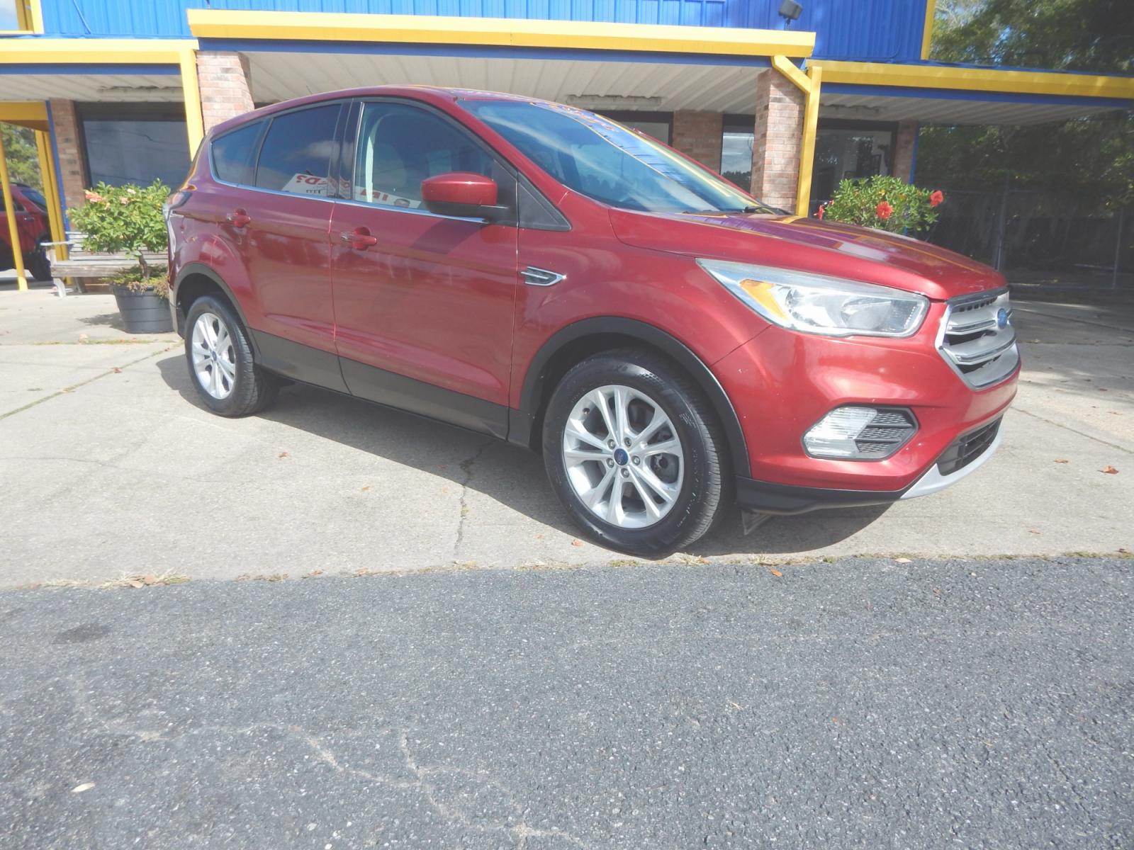 2017 Maroon /Tan Ford Escape SE FWD (1FMCU0G97HU) with an 2.0L L4 DOHC 16V engine, Automatic transmission, located at 3120 W Tennessee St, Tallahassee, FL, 32304-1002, (850) 575-6702, 30.458841, -84.349648 - Used Car Supermarket is proud to present you with this loaded immaculate 2017 Ford Escape SE. Used Car Supermarket prides itself in offering you the finest pre-owned vehicle in Tallahassee. Used Car Supermarket has been locally family owned and operated for over 48 years. Our Escape SE has been serv - Photo #0