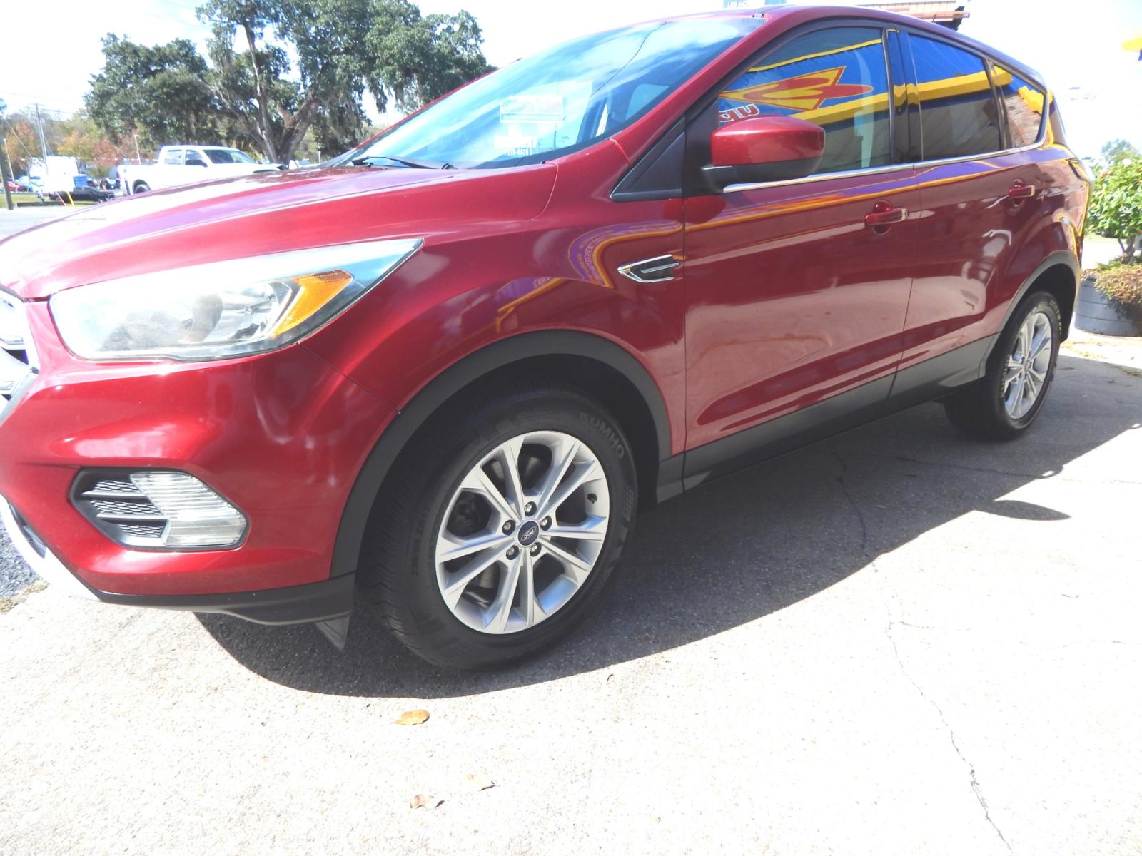2017 Maroon /Tan Ford Escape SE FWD (1FMCU0G97HU) with an 2.0L L4 DOHC 16V engine, Automatic transmission, located at 3120 W Tennessee St, Tallahassee, FL, 32304-1002, (850) 575-6702, 30.458841, -84.349648 - Used Car Supermarket is proud to present you with this loaded immaculate 2017 Ford Escape SE. Used Car Supermarket prides itself in offering you the finest pre-owned vehicle in Tallahassee. Used Car Supermarket has been locally family owned and operated for over 48 years. Our Escape SE has been serv - Photo #1
