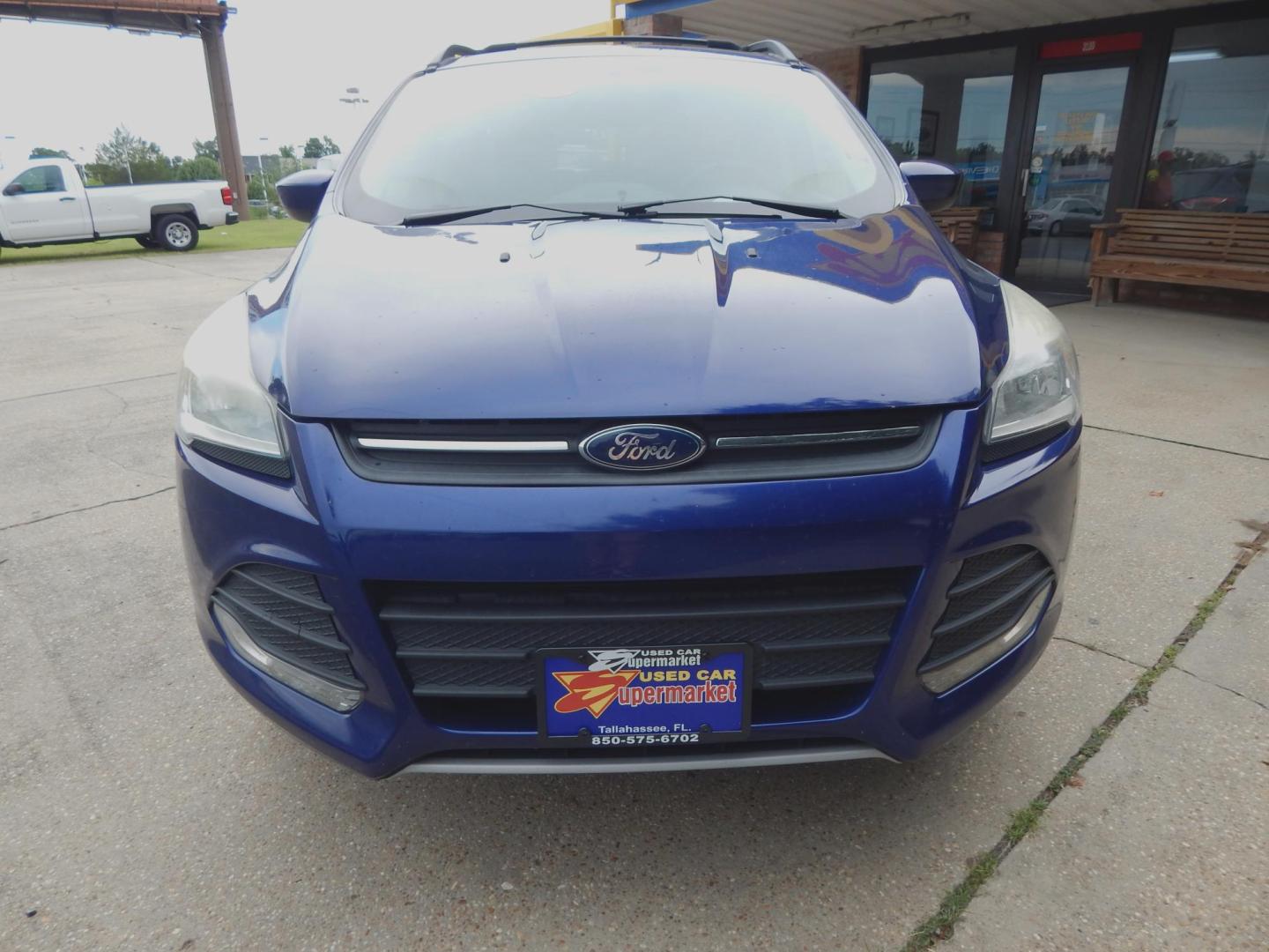 2013 Blue /Gray Ford Escape SE (1FMCU0GX3DU) with an 1.6L 4 cyl. engine, Automatic transmission, located at 3120 W Tennessee St, Tallahassee, FL, 32304-1002, (850) 575-6702, 30.458841, -84.349648 - Used Car Supermarket is proud to present you with this loaded immaculate 2013 Ford Escape SE with low miles. Used Car Supermarket prides itself in offering you the finest pre-owned vehicle in Tallahassee. Used Car Supermarket has been locally family owned and operated for over 50 years. Our Escape S - Photo#2