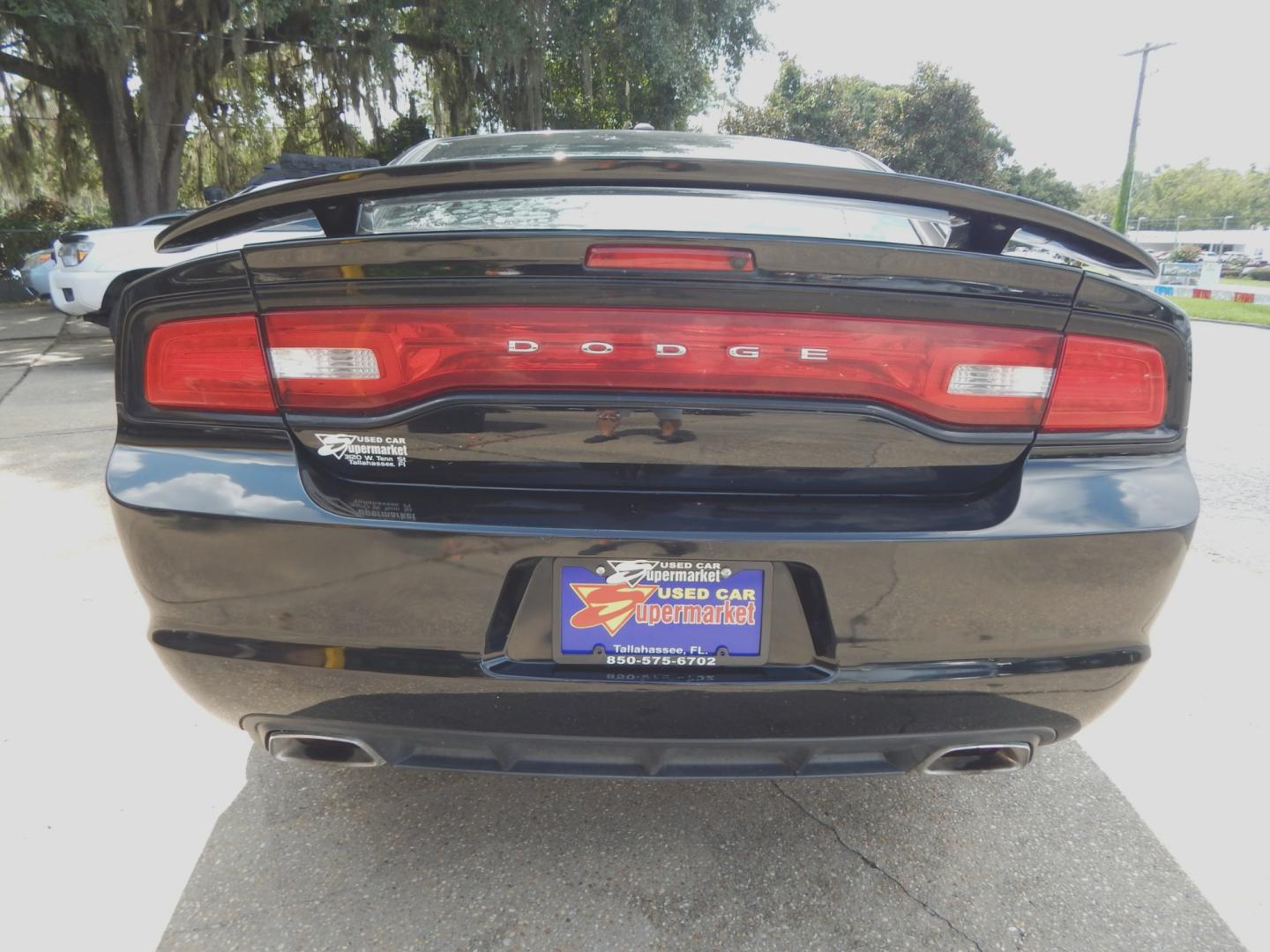 2013 Black /Charcoal Dodge Charger SXT (2C3CDXJG0DH) with an 3.6L 6 Cyl. engine, Automatic transmission, located at 3120 W Tennessee St, Tallahassee, FL, 32304-1002, (850) 575-6702, 30.458841, -84.349648 - Photo#3