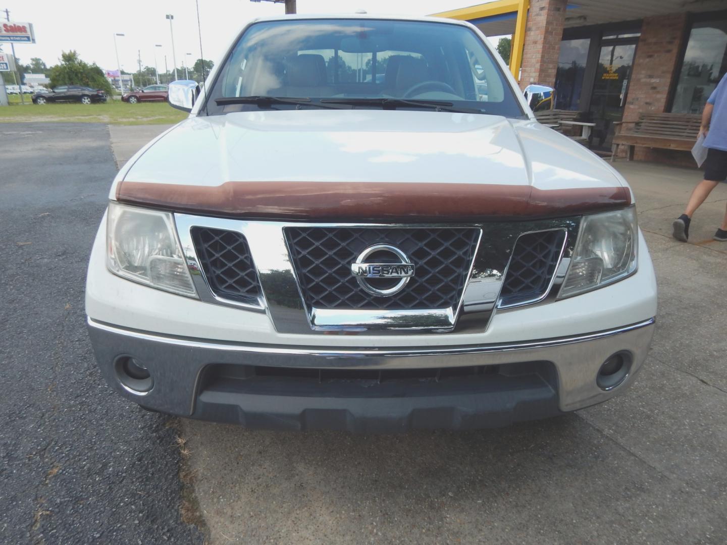 2015 white /Tan Leather Nissan Frontier SL (1N6AD0ER8FN) with an 4.0L 6 Cyl. engine, Automatic transmission, located at 3120 W Tennessee St, Tallahassee, FL, 32304-1002, (850) 575-6702, 30.458841, -84.349648 - Used Car Supermarket is proud to present you with this loaded immaculate 2015 Nissan Frontier Crew Cab SL with leather and low miles. Used Car Supermarket prides itself in offering you the finest pre-owned vehicle in Tallahassee. Used Car Supermarket has been locally family owned and operated for ov - Photo#2