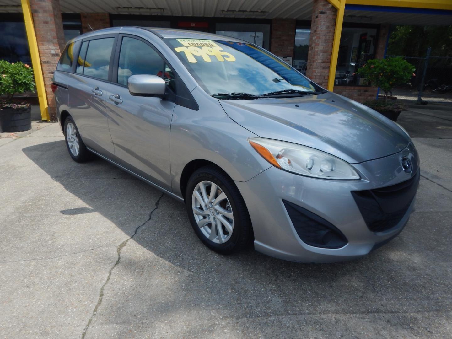 2012 Silver Metallic /Gray Mazda MAZDA5 Sport (JM1CW2BL6C0) with an 2.5l-4 cyl. engine, Automatic transmission, located at 3120 W Tennessee St, Tallahassee, FL, 32304-1002, (850) 575-6702, 30.458841, -84.349648 - Used Car Supermarket is proud to present you with this loaded immaculate 2012 Mazda5 Sport with 3rd row seating. Used Car Supermarket prides itself in offering you the finest pre-owned vehicle in Tallahassee. Used Car Supermarket has been locally family owned and operated for over 48 years. Our Mazd - Photo#0