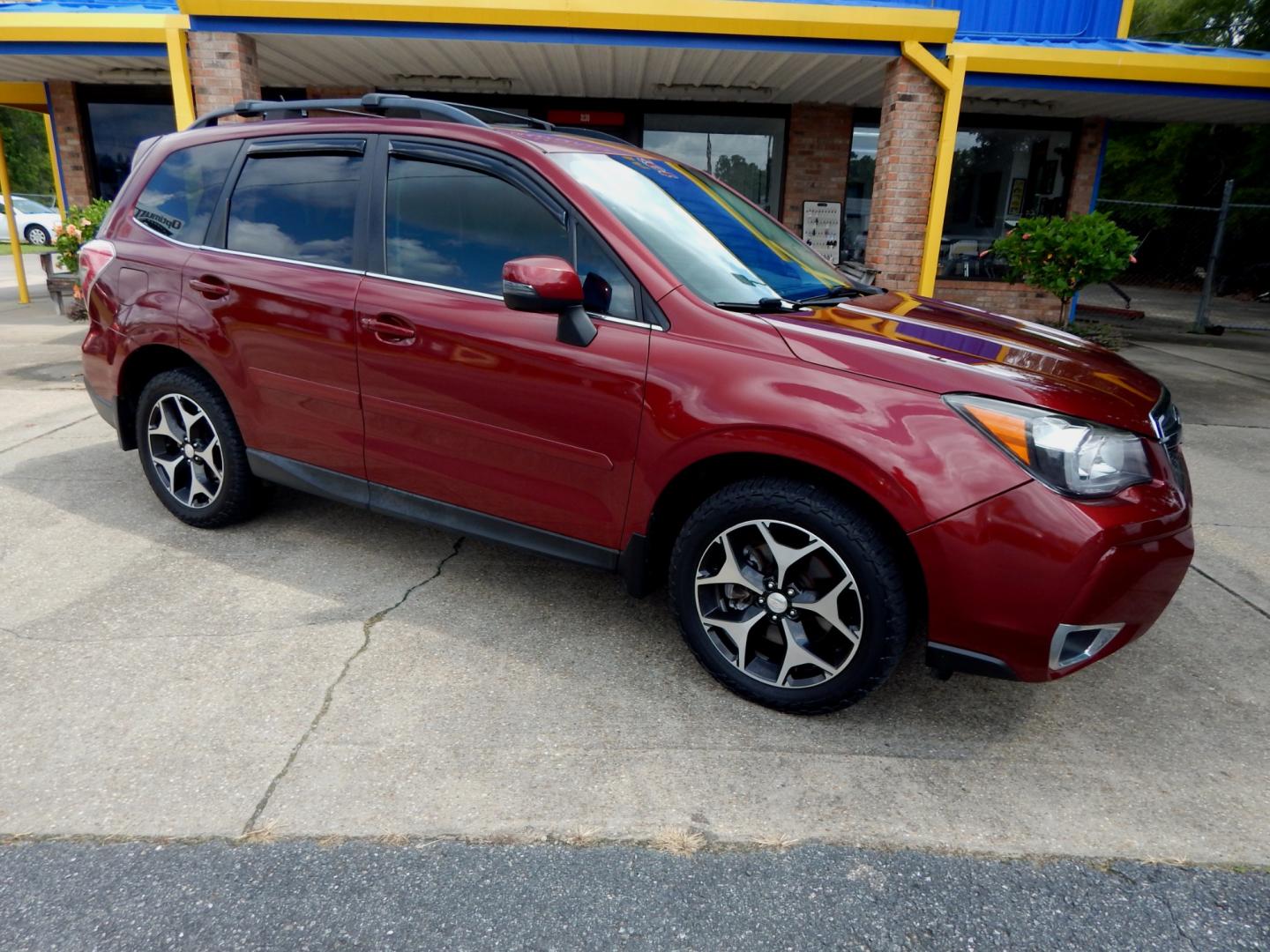 2014 Maroon /Charcoal Leather Subaru Forester XT Touring (JF2SJGMC8EH) with an 2.0L engine, Automatic transmission, located at 3120 W Tennessee St, Tallahassee, FL, 32304-1002, (850) 575-6702, 30.458841, -84.349648 - Used Car Supermarket is proud to present you with this loaded immaculate 2014 Subaru Forester 2.0XT Touring with leather, sunroof, Navigation and low miles . Used Car Supermarket prides itself in offering you the finest pre-owned vehicle in Tallahassee. Used Car Supermarket has been locally family o - Photo#0