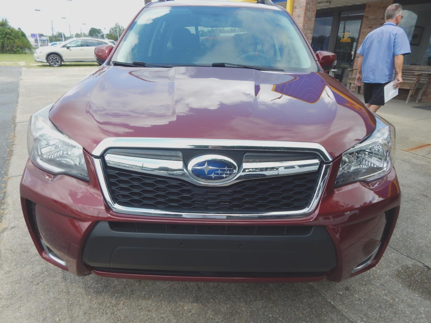 2014 Maroon /Charcoal Leather Subaru Forester XT Touring (JF2SJGMC8EH) with an 2.0L engine, Automatic transmission, located at 3120 W Tennessee St, Tallahassee, FL, 32304-1002, (850) 575-6702, 30.458841, -84.349648 - Used Car Supermarket is proud to present you with this loaded immaculate 2014 Subaru Forester 2.0XT Touring with leather, sunroof, Navigation and low miles . Used Car Supermarket prides itself in offering you the finest pre-owned vehicle in Tallahassee. Used Car Supermarket has been locally family o - Photo#2