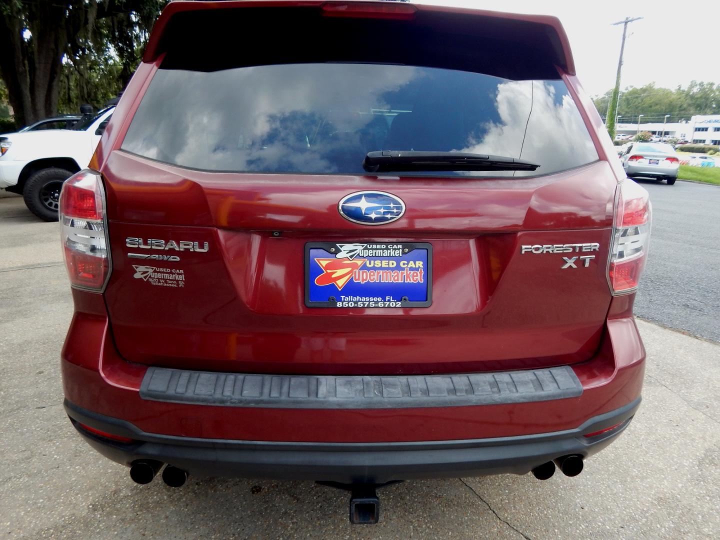 2014 Maroon /Charcoal Leather Subaru Forester XT Touring (JF2SJGMC8EH) with an 2.0L engine, Automatic transmission, located at 3120 W Tennessee St, Tallahassee, FL, 32304-1002, (850) 575-6702, 30.458841, -84.349648 - Used Car Supermarket is proud to present you with this loaded immaculate 2014 Subaru Forester 2.0XT Touring with leather, sunroof, Navigation and low miles . Used Car Supermarket prides itself in offering you the finest pre-owned vehicle in Tallahassee. Used Car Supermarket has been locally family o - Photo#3