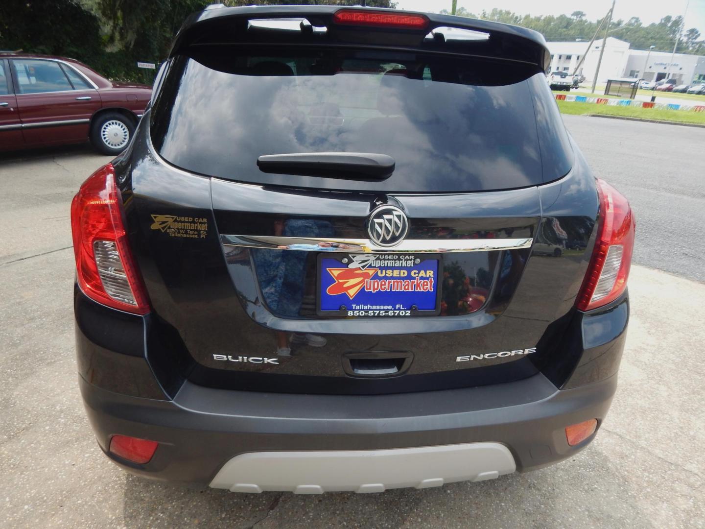 2016 Black /Charcoal Buick Encore Sport Touring (KL4CJ1SM4GB) with an 1.4L engine, Automatic transmission, located at 3120 W Tennessee St, Tallahassee, FL, 32304-1002, (850) 575-6702, 30.458841, -84.349648 - Used Car Supermarket is proud to present you with this loaded immaculate 2016 Buick Encore Sport Touring with leather, sunroof and low miles. Used Car Supermarket prides itself in offering you the finest pre-owned vehicle in Tallahassee. Used Car Supermarket has been locally family owned and operate - Photo#3