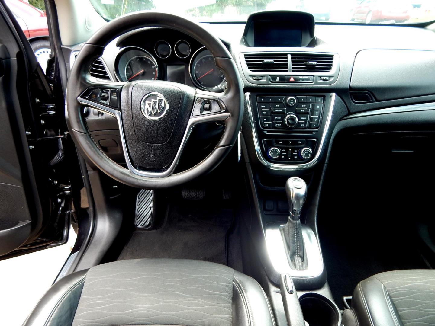 2016 Black /Charcoal Buick Encore Sport Touring (KL4CJ1SM4GB) with an 1.4L engine, Automatic transmission, located at 3120 W Tennessee St, Tallahassee, FL, 32304-1002, (850) 575-6702, 30.458841, -84.349648 - Used Car Supermarket is proud to present you with this loaded immaculate 2016 Buick Encore Sport Touring with leather, sunroof and low miles. Used Car Supermarket prides itself in offering you the finest pre-owned vehicle in Tallahassee. Used Car Supermarket has been locally family owned and operate - Photo#4