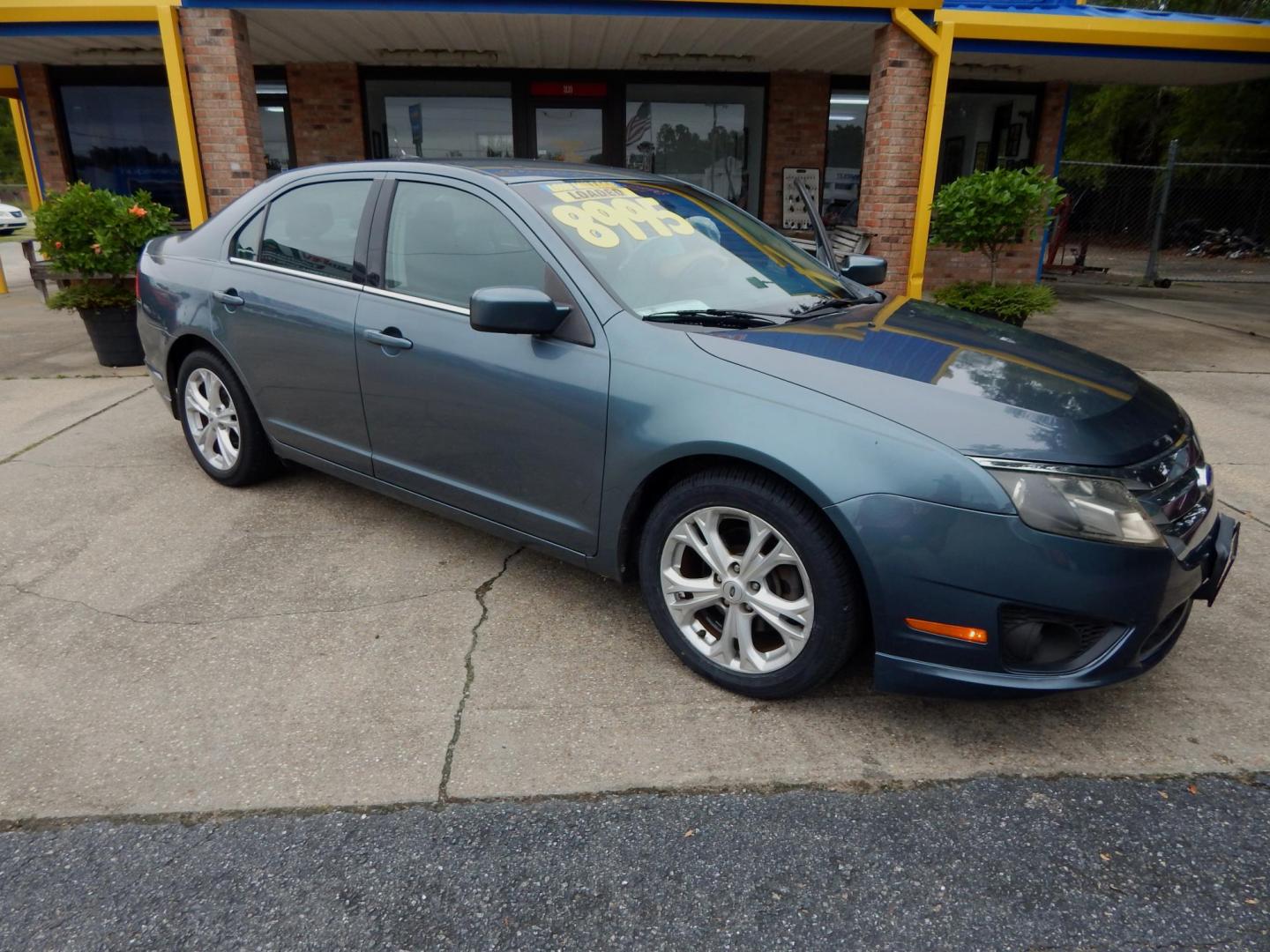 2012 Blue /Charcoal Ford Fusion SE (3FAHP0HA8CR) with an 2.5L L4 DOHC 16V engine, Automatic transmission, located at 3120 W Tennessee St, Tallahassee, FL, 32304-1002, (850) 575-6702, 30.458841, -84.349648 - Photo#0