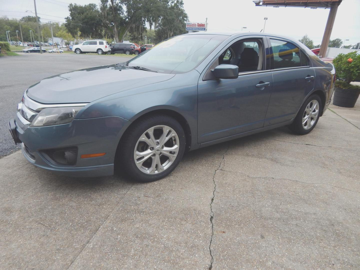 2012 Blue /Charcoal Ford Fusion SE (3FAHP0HA8CR) with an 2.5L L4 DOHC 16V engine, Automatic transmission, located at 3120 W Tennessee St, Tallahassee, FL, 32304-1002, (850) 575-6702, 30.458841, -84.349648 - Photo#1