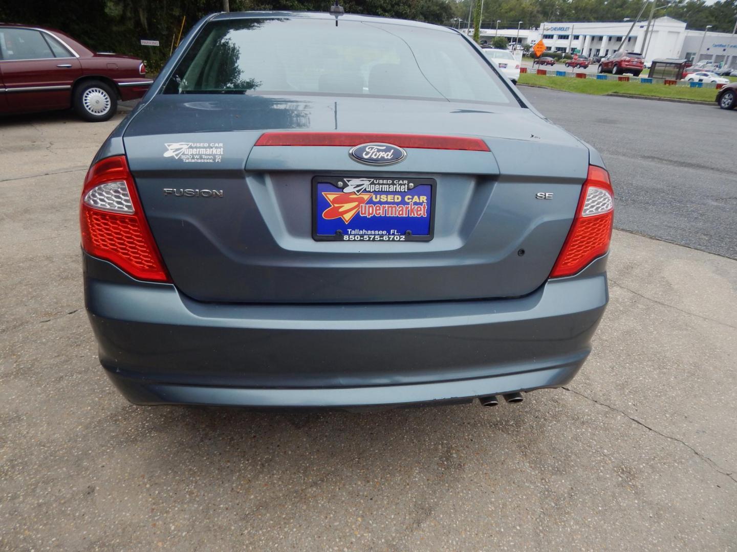 2012 Blue /Charcoal Ford Fusion SE (3FAHP0HA8CR) with an 2.5L L4 DOHC 16V engine, Automatic transmission, located at 3120 W Tennessee St, Tallahassee, FL, 32304-1002, (850) 575-6702, 30.458841, -84.349648 - Photo#3