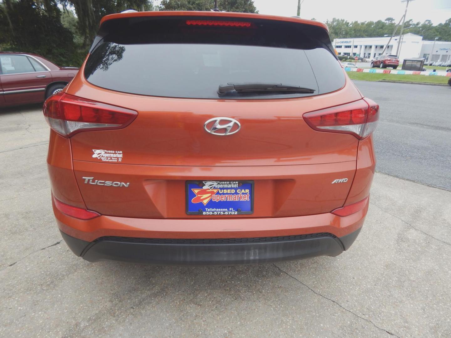 2016 Copper /Charcoal Hyundai Tucson SE w/Preferred Package AWD (KM8J3CA46GU) with an 2.0L L4 DOHC 16V engine, Automatic transmission, located at 3120 W Tennessee St, Tallahassee, FL, 32304-1002, (850) 575-6702, 30.458841, -84.349648 - Used Car Supermarket is proud to present you with this loaded immaculate 2016 Hyundai Tucson SE Preferred with low miles. Used Car Supermarket prides itself in offering you the finest pre-owned vehicle in Tallahassee. Used Car Supermarket has been locally family owned and operated for over 48 years. - Photo#3