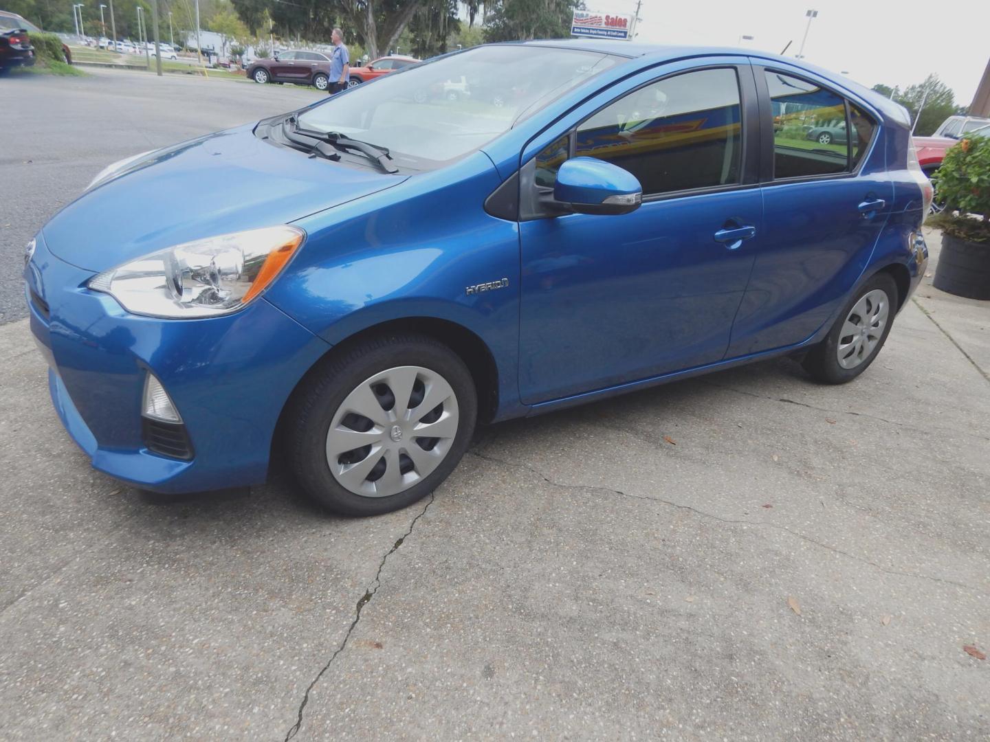 2012 Blue /Gray Toyota Prius c TWO (JTDKDTB37C1) with an 1.5L L4 DOHC 16V HYBRID engine, Continuously Variable Transmission transmission, located at 3120 W Tennessee St, Tallahassee, FL, 32304-1002, (850) 575-6702, 30.458841, -84.349648 - Used Car Supermarket is proud to present you with this loaded immaculate 2012 Toyota Prius TWO. Used Car Supermarket prides itself in offering you the finest pre-owned vehicle in Tallahassee. Used Car Supermarket has been locally family owned and operated for over 48 years. Our Prius TWO has been se - Photo#1