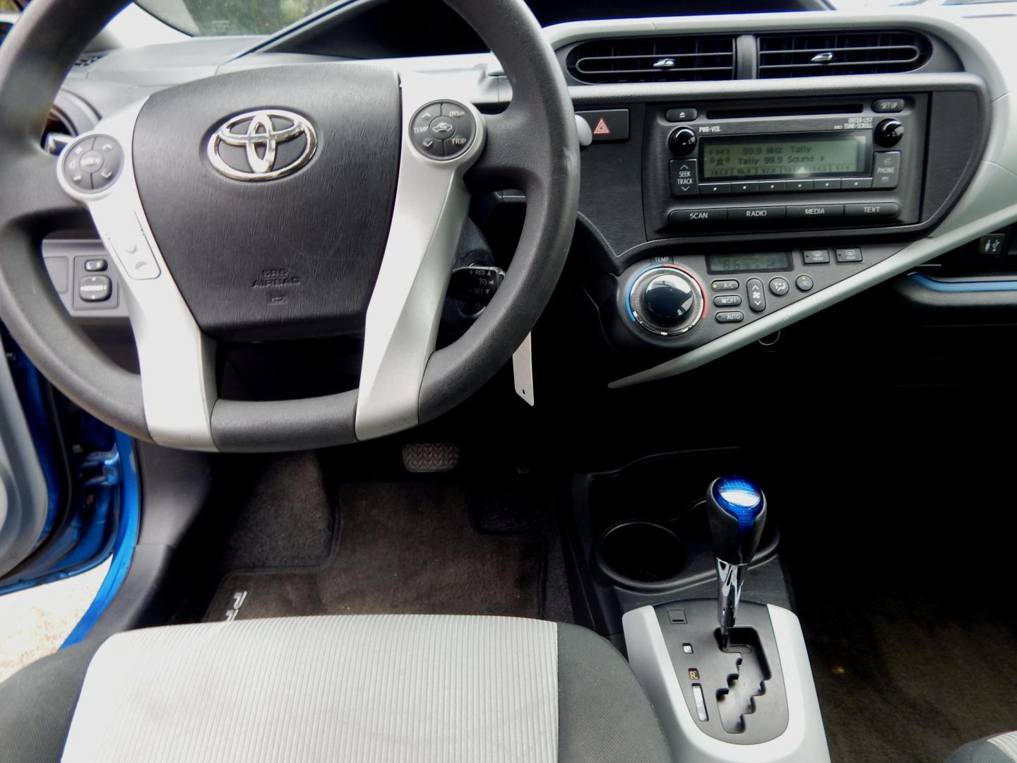 2012 Blue /Gray Toyota Prius c TWO (JTDKDTB37C1) with an 1.5L L4 DOHC 16V HYBRID engine, Continuously Variable Transmission transmission, located at 3120 W Tennessee St, Tallahassee, FL, 32304-1002, (850) 575-6702, 30.458841, -84.349648 - Used Car Supermarket is proud to present you with this loaded immaculate 2012 Toyota Prius TWO. Used Car Supermarket prides itself in offering you the finest pre-owned vehicle in Tallahassee. Used Car Supermarket has been locally family owned and operated for over 48 years. Our Prius TWO has been se - Photo#4