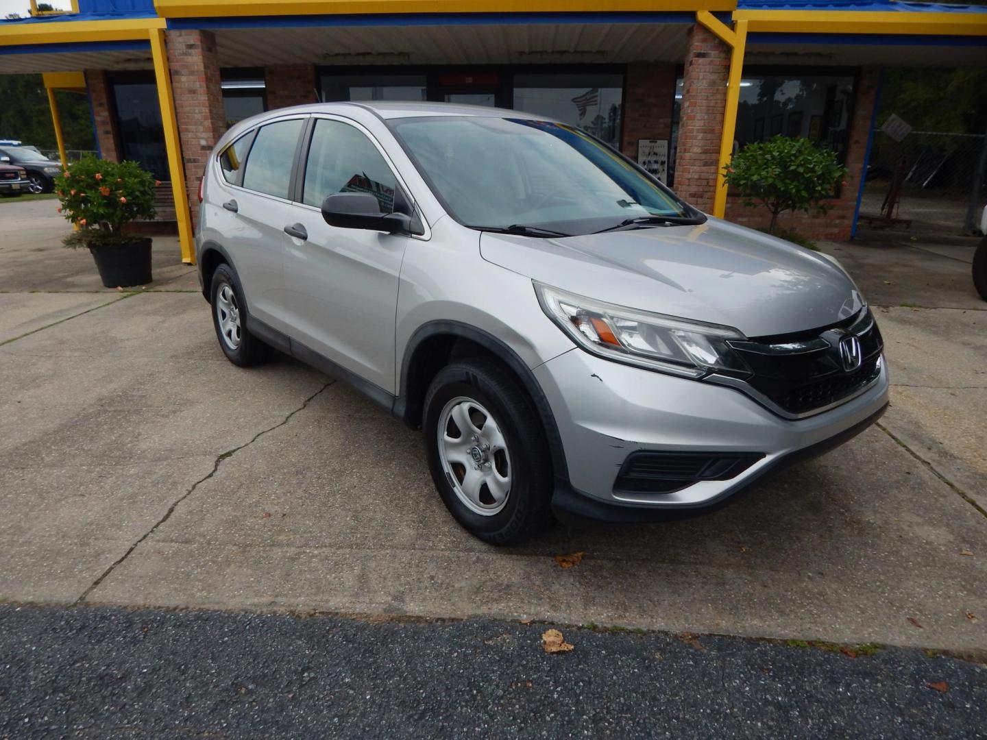 2015 Silver Metallic /Gray Honda CR-V LX 2WD (3CZRM3H39FG) with an 2.4L L4 DOHC 16V engine, Continuously Variable Transmission transmission, located at 3120 W Tennessee St, Tallahassee, FL, 32304-1002, (850) 575-6702, 30.458841, -84.349648 - Photo#0