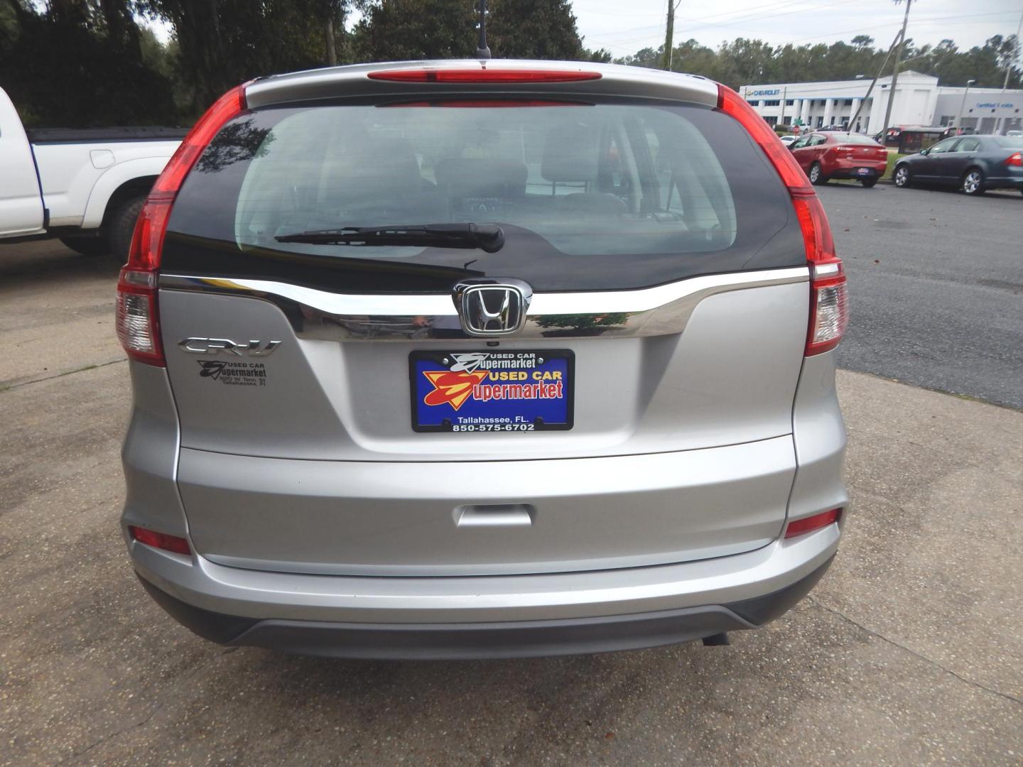 2015 Silver Metallic /Gray Honda CR-V LX 2WD (3CZRM3H39FG) with an 2.4L L4 DOHC 16V engine, Continuously Variable Transmission transmission, located at 3120 W Tennessee St, Tallahassee, FL, 32304-1002, (850) 575-6702, 30.458841, -84.349648 - Photo#3