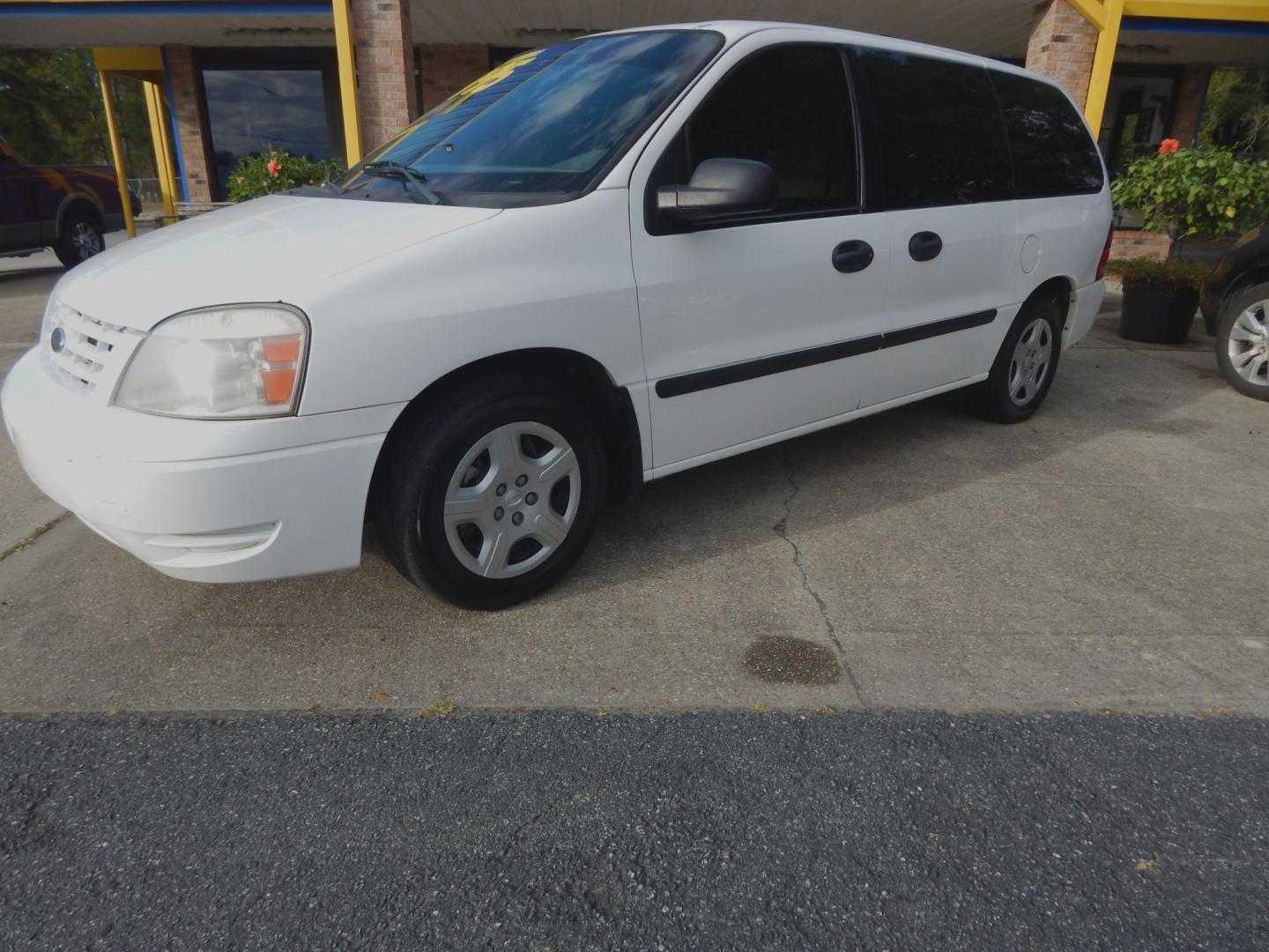 2005 White /Gray Ford Freestar S (2FMZA50685B) with an 3.9L V6 OHV 12V engine, 4-Speed Automatic Overdrive transmission, located at 3120 W Tennessee St, Tallahassee, FL, 32304-1002, (850) 575-6702, 30.458841, -84.349648 - Used Car Supermarket is proud to present you with this loaded immaculate 2005 Ford Freestar S minivan with low miles. Used Car Supermarket prides itself in offering you the finest pre-owned vehicle in Tallahassee. Used Car Supermarket has been locally family owned and operated for over 48 years. Our - Photo#0