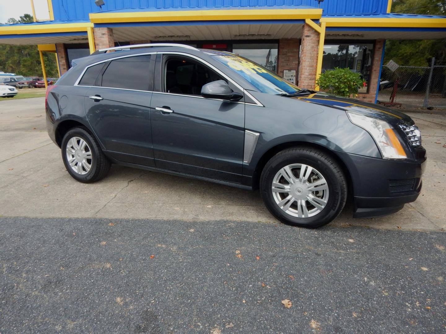 2013 Charcoal /Charcoal Leather Cadillac SRX Premium (3GYFNCE32DS) with an 3.6L V6 DOHC 24V FFV engine, 6-Speed Automatic transmission, located at 3120 W Tennessee St, Tallahassee, FL, 32304-1002, (850) 575-6702, 30.458841, -84.349648 - Used Car Supermarket is proud to present you with this loaded immaculate 2013 Cadilac SRX Luxury with low miles. Used Car Supermarket prides itself in offering you the finest pre-owned vehicle in Tallahassee. Used Car Supermarket has been locally family owned and operated for over 48 years. Our SRX - Photo#0