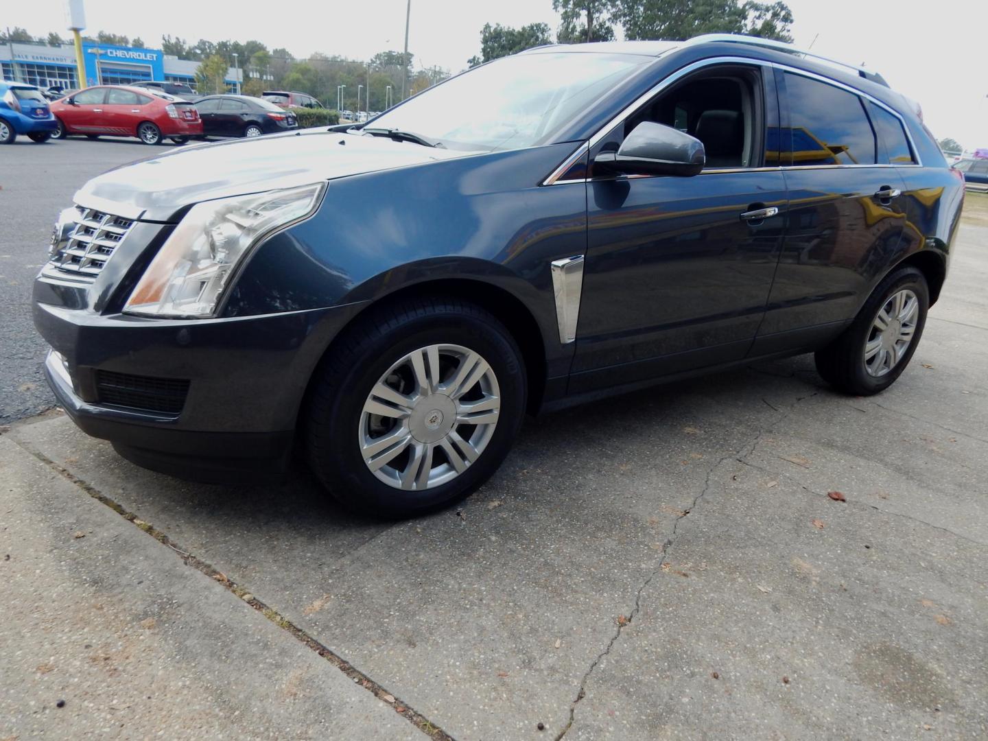 2013 Charcoal /Charcoal Leather Cadillac SRX Premium (3GYFNCE32DS) with an 3.6L V6 DOHC 24V FFV engine, 6-Speed Automatic transmission, located at 3120 W Tennessee St, Tallahassee, FL, 32304-1002, (850) 575-6702, 30.458841, -84.349648 - Used Car Supermarket is proud to present you with this loaded immaculate 2013 Cadilac SRX Luxury with low miles. Used Car Supermarket prides itself in offering you the finest pre-owned vehicle in Tallahassee. Used Car Supermarket has been locally family owned and operated for over 48 years. Our SRX - Photo#1