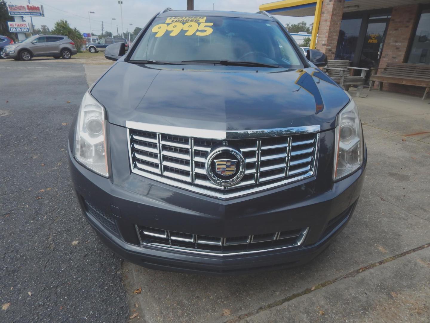 2013 Charcoal /Charcoal Leather Cadillac SRX Premium (3GYFNCE32DS) with an 3.6L V6 DOHC 24V FFV engine, 6-Speed Automatic transmission, located at 3120 W Tennessee St, Tallahassee, FL, 32304-1002, (850) 575-6702, 30.458841, -84.349648 - Used Car Supermarket is proud to present you with this loaded immaculate 2013 Cadilac SRX Luxury with low miles. Used Car Supermarket prides itself in offering you the finest pre-owned vehicle in Tallahassee. Used Car Supermarket has been locally family owned and operated for over 48 years. Our SRX - Photo#2