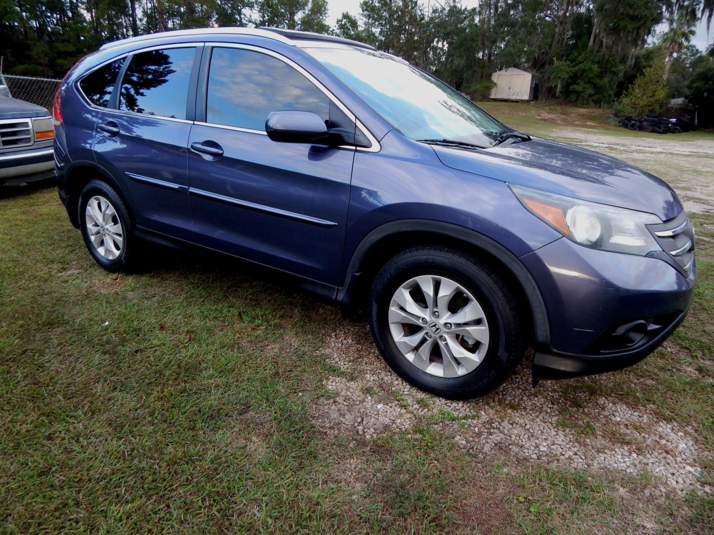 2013 Blue /Gray Leather Honda CR-V EX-L 2WD (2HKRM3H77DH) with an 2.4L L4 DOHC 16V engine, Automatic transmission, located at 3120 W Tennessee St, Tallahassee, FL, 32304-1002, (850) 575-6702, 30.458841, -84.349648 - Used Car Supermarket is proud to present you with this loaded immaculate 2013 Honda CRV EX-L with leather and sunroof. Used Car Supermarket prides itself in offering you the finest pre-owned vehicle in Tallahassee. Used Car Supermarket has been locally family owned and operated for a half century. O - Photo#1