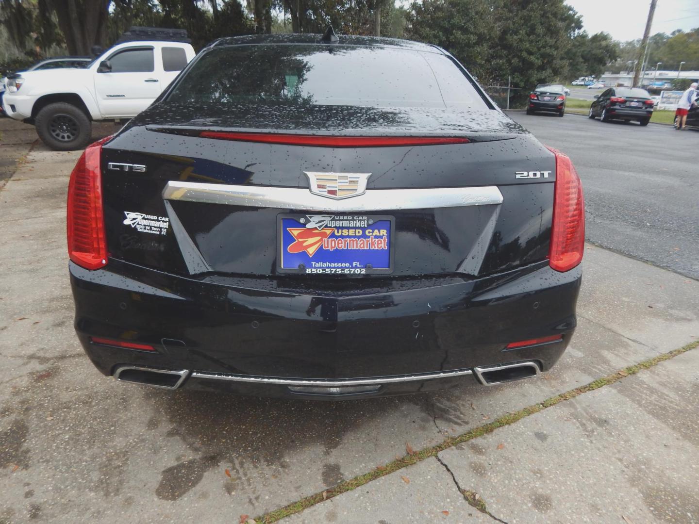 2016 Black /Charcoal Leather Cadillac CTS 2.0L Turbo Luxury RWD (1G6AR5SXXG0) with an 2.0L L4 DOHC 24V TURBO engine, Automatic transmission, located at 3120 W Tennessee St, Tallahassee, FL, 32304-1002, (850) 575-6702, 30.458841, -84.349648 - Photo#3