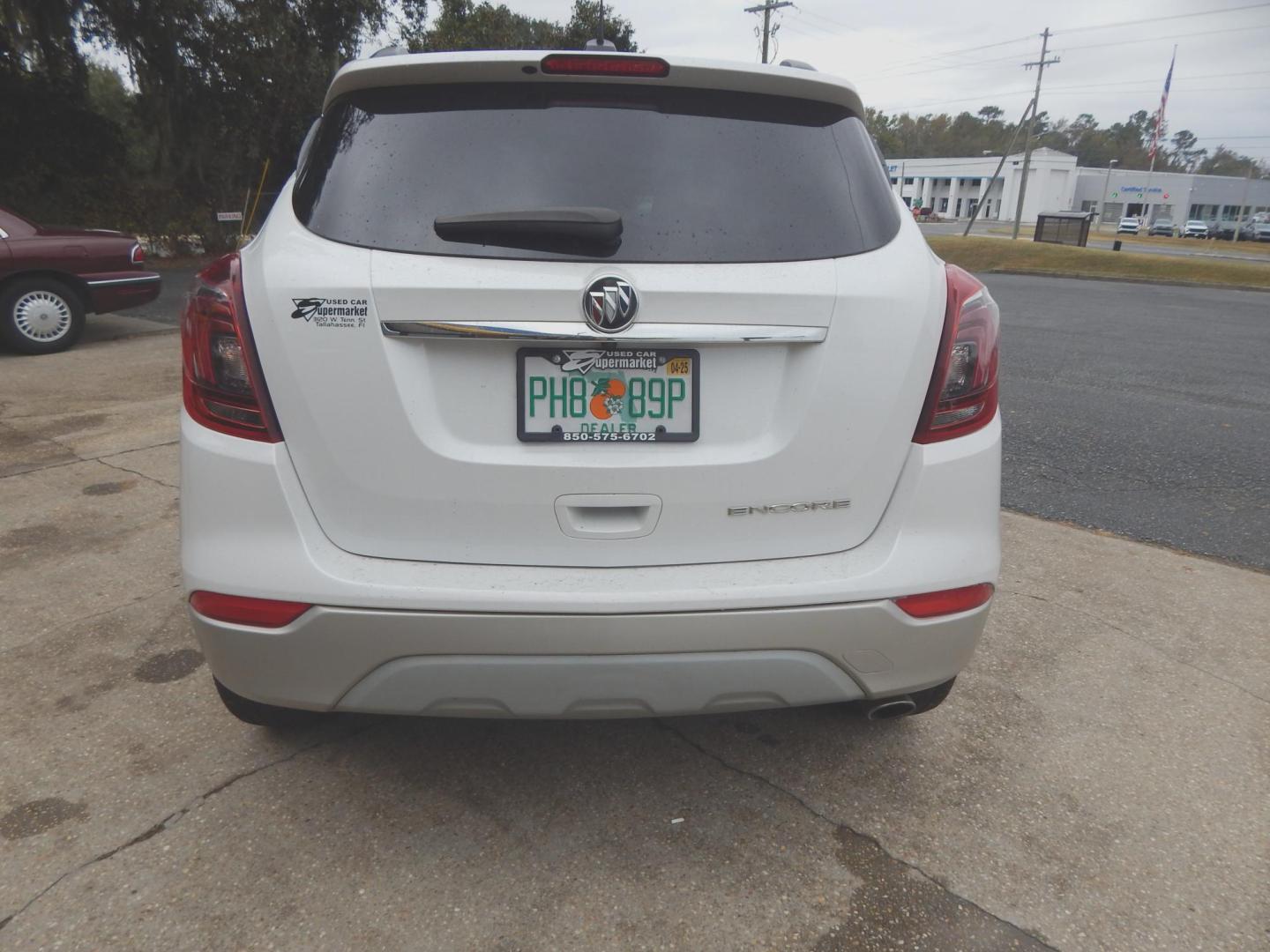 2021 White /Charcoal Leather Buick Encore Preferred FWD (KL4CJASB7MB) with an 1.4L L4 DOHC 16V TURBO engine, Automatic transmission, located at 3120 W Tennessee St, Tallahassee, FL, 32304-1002, (850) 575-6702, 30.458841, -84.349648 - Photo#3