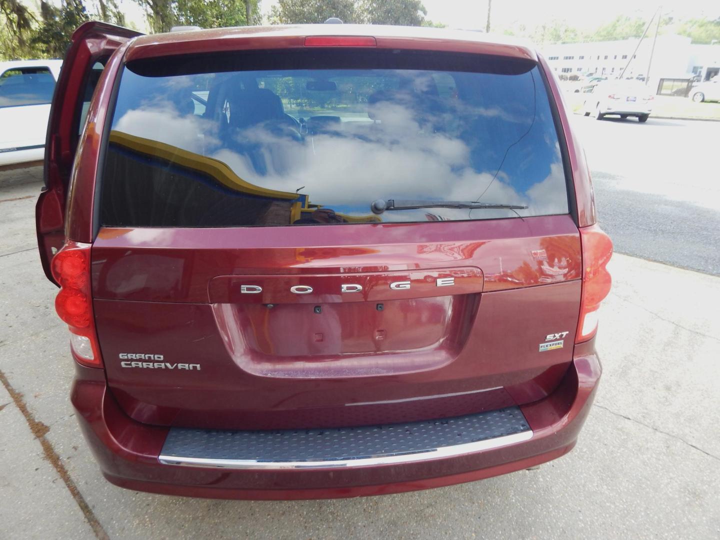 2019 Maroon /Charcoal Leather Dodge Grand Caravan SXT (2C4RDGCG3KR) with an 3.6L V6 DOHC 24V engine, Automatic transmission, located at 3120 W Tennessee St, Tallahassee, FL, 32304-1002, (850) 575-6702, 30.458841, -84.349648 - We are selling this vehicle as a cash sale, as/is with no warranty. It runs and drives great and everything works, body and interior are in good shape. The check engine light is on and it has a rough idle. The price is heavily discounted so there will be no more negotiation. - Photo#3