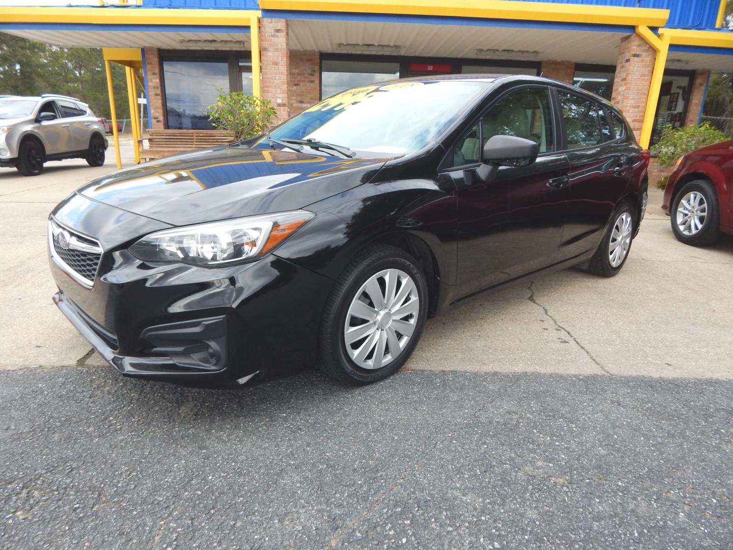 2018 Black /Tan Subaru Impreza 2.0i CVT 5-Door (4S3GTAA64J1) with an 2.0L H4 DOHC 16V engine, manual transmission, located at 3120 W Tennessee St, Tallahassee, FL, 32304-1002, (850) 575-6702, 30.458841, -84.349648 - Used Car Supermarket is proud to present you with this loaded immaculate 2018 Subaru Impreza 5 door with low miles. Used Car Supermarket prides itself in offering you the finest pre-owned vehicle in Tallahassee. Used Car Supermarket has been locally family owned and operated for over 49 years. Our I - Photo#0