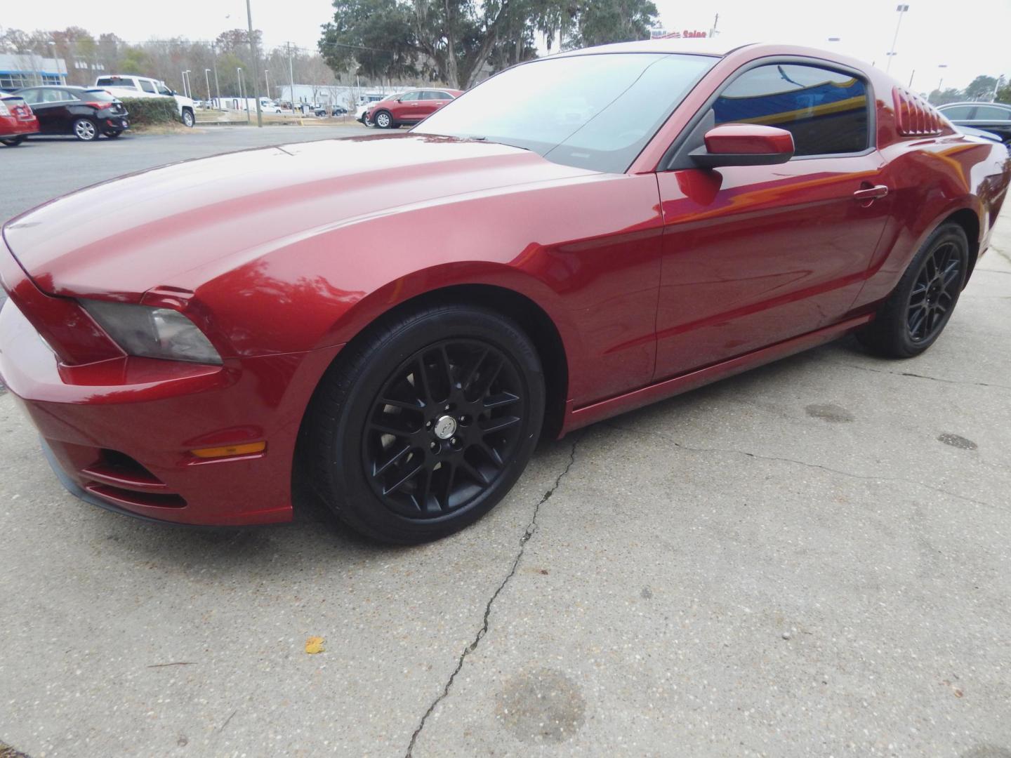 2014 Maroon /Charcoal Leather Ford Mustang V6 Coupe (1ZVBP8AM7E5) with an 3.7L V6 DOHC 24V engine, Automatic transmission, located at 3120 W Tennessee St, Tallahassee, FL, 32304-1002, (850) 575-6702, 30.458841, -84.349648 - Used Car Supermarket is proud to present you with this loaded immaculate 2014 Ford Mustang with leather. Used Car Supermarket prides itself in offering you the finest pre-owned vehicle in Tallahassee. Used Car Supermarket has been locally family owned and operated for over 49 years. Our Mustang has - Photo#1