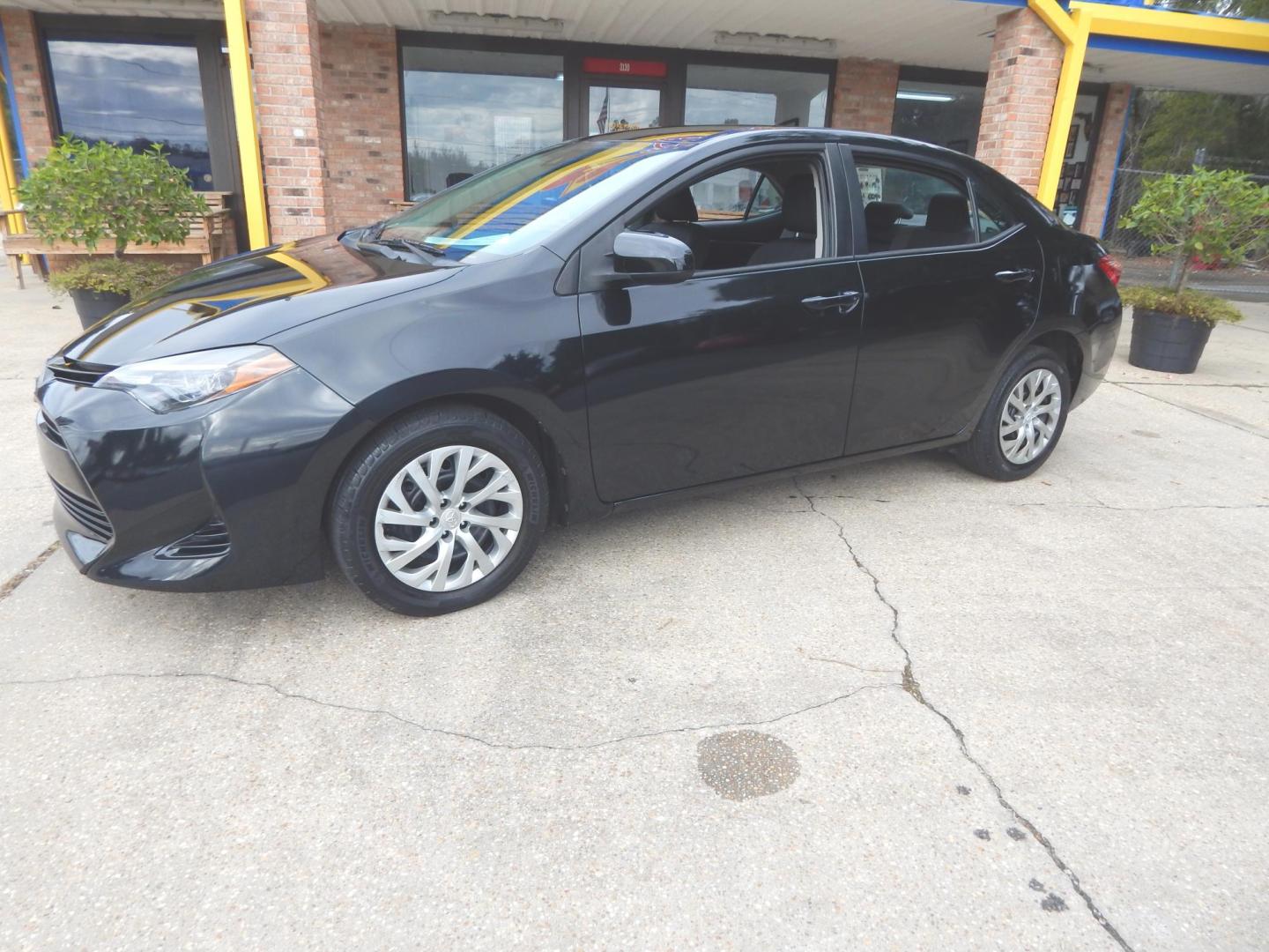 2017 Black /Gray Toyota Corolla LE (2T1BURHE7HC) with an 1.8L L4 DOHC 16V engine, Automatic transmission, located at 3120 W Tennessee St, Tallahassee, FL, 32304-1002, (850) 575-6702, 30.458841, -84.349648 - Used Car Supermarket is proud to present you with this loaded immaculate 2017 Toyota Corolla LE with low miles. Used Car Supermarket prides itself in offering you the finest pre-owned vehicle in Tallahassee. Used Car Supermarket has been locally family owned and operated for over 49 years. Our Corol - Photo#0