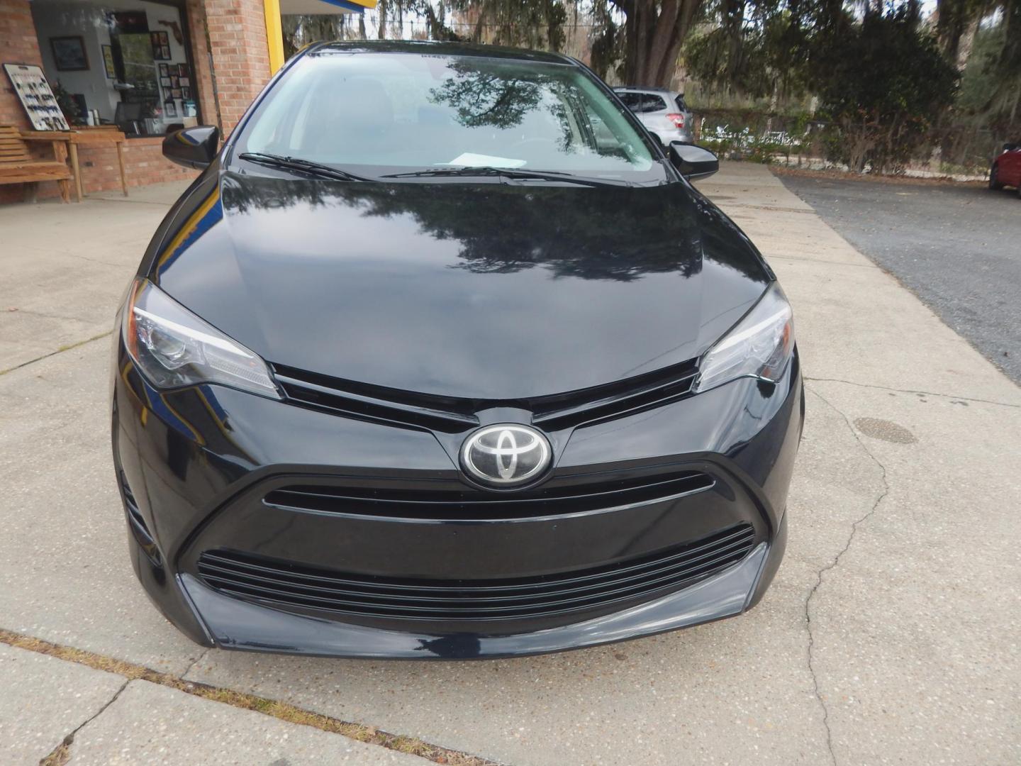 2017 Black /Gray Toyota Corolla LE (2T1BURHE7HC) with an 1.8L L4 DOHC 16V engine, Automatic transmission, located at 3120 W Tennessee St, Tallahassee, FL, 32304-1002, (850) 575-6702, 30.458841, -84.349648 - Used Car Supermarket is proud to present you with this loaded immaculate 2017 Toyota Corolla LE with low miles. Used Car Supermarket prides itself in offering you the finest pre-owned vehicle in Tallahassee. Used Car Supermarket has been locally family owned and operated for over 49 years. Our Corol - Photo#2