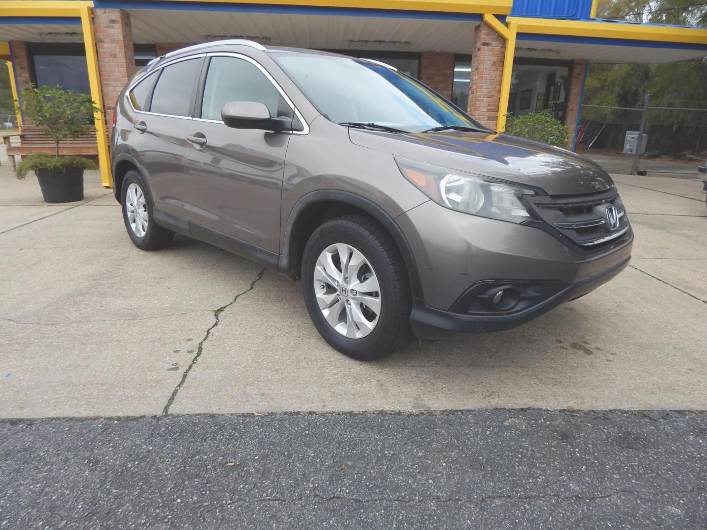 2013 Taupe /Tan Leather Honda CR-V EX-L 2WD 5-Speed AT (5J6RM3H72DL) with an 2.4L L4 DOHC 16V engine, Automatic transmission, located at 3120 W Tennessee St, Tallahassee, FL, 32304-1002, (850) 575-6702, 30.458841, -84.349648 - Used Car Supermarket is proud to present you with this loaded immaculate 2013 Honda CRV EX-L with leather, sunroof and low miles. Used Car Supermarket prides itself in offering you the finest pre-owned vehicle in Tallahassee. Used Car Supermarket has been locally family owned and operated for over 4 - Photo#0