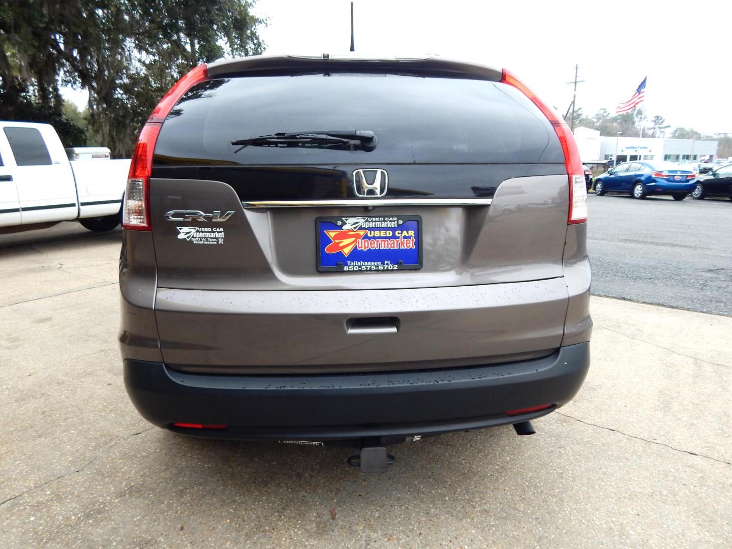 2013 Taupe /Tan Leather Honda CR-V EX-L 2WD 5-Speed AT (5J6RM3H72DL) with an 2.4L L4 DOHC 16V engine, Automatic transmission, located at 3120 W Tennessee St, Tallahassee, FL, 32304-1002, (850) 575-6702, 30.458841, -84.349648 - Used Car Supermarket is proud to present you with this loaded immaculate 2013 Honda CRV EX-L with leather, sunroof and low miles. Used Car Supermarket prides itself in offering you the finest pre-owned vehicle in Tallahassee. Used Car Supermarket has been locally family owned and operated for over 4 - Photo#3