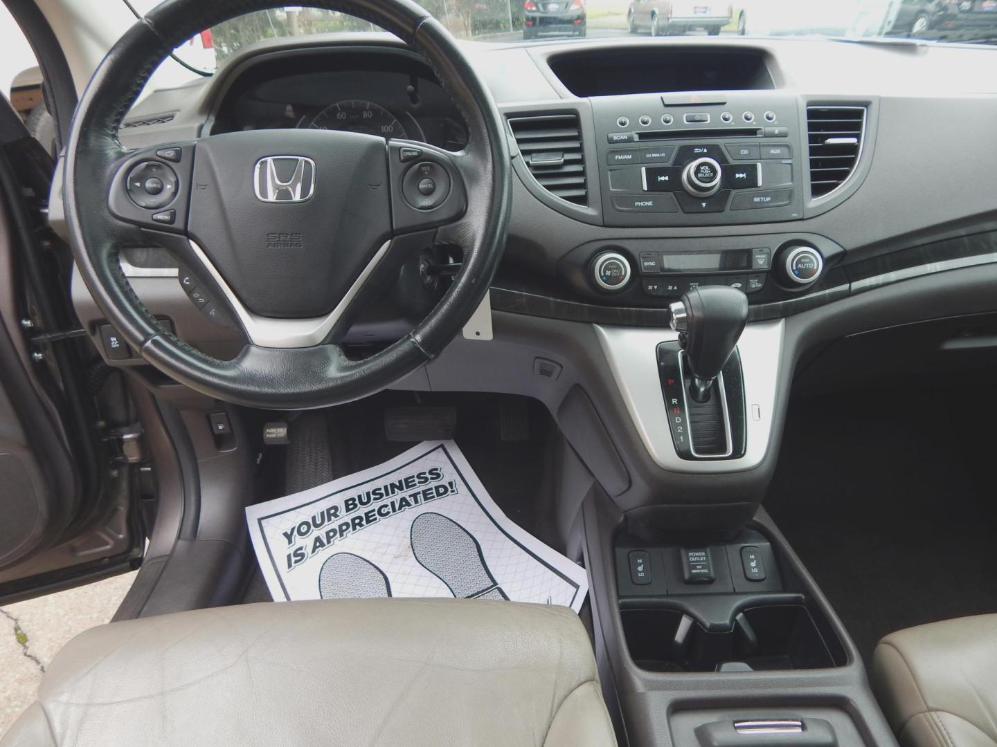 2013 Taupe /Tan Leather Honda CR-V EX-L 2WD 5-Speed AT (5J6RM3H72DL) with an 2.4L L4 DOHC 16V engine, Automatic transmission, located at 3120 W Tennessee St, Tallahassee, FL, 32304-1002, (850) 575-6702, 30.458841, -84.349648 - Used Car Supermarket is proud to present you with this loaded immaculate 2013 Honda CRV EX-L with leather, sunroof and low miles. Used Car Supermarket prides itself in offering you the finest pre-owned vehicle in Tallahassee. Used Car Supermarket has been locally family owned and operated for over 4 - Photo#4