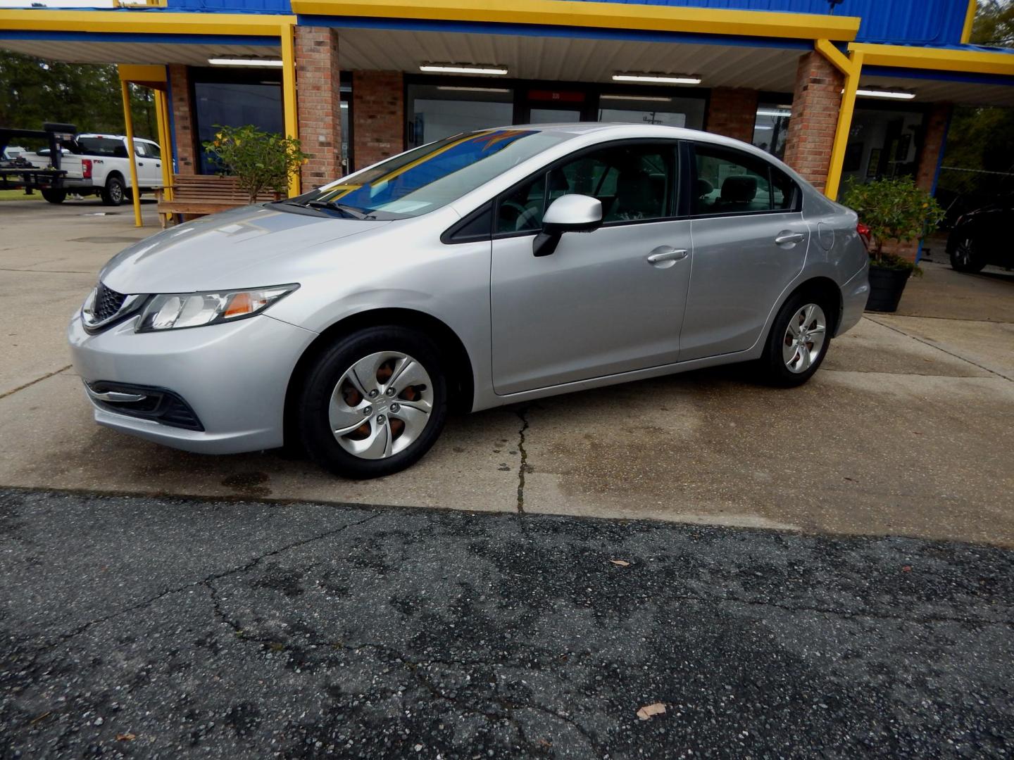 2013 Silver Metallic /Gray Honda Civic LX Sedan (19XFB2F55DE) with an 1.8L L4 SOHC 16V engine, Automatic transmission, located at 3120 W Tennessee St, Tallahassee, FL, 32304-1002, (850) 575-6702, 30.458841, -84.349648 - Used Car Supermarket is proud to present you with this loaded immaculate 2013 Honda Civic LX sedan with low miles. Used Car Supermarket prides itself in offering you the finest pre-owned vehicle in Tallahassee. Used Car Supermarket has been locally family owned and operated for over 49 years. Our Ci - Photo#0