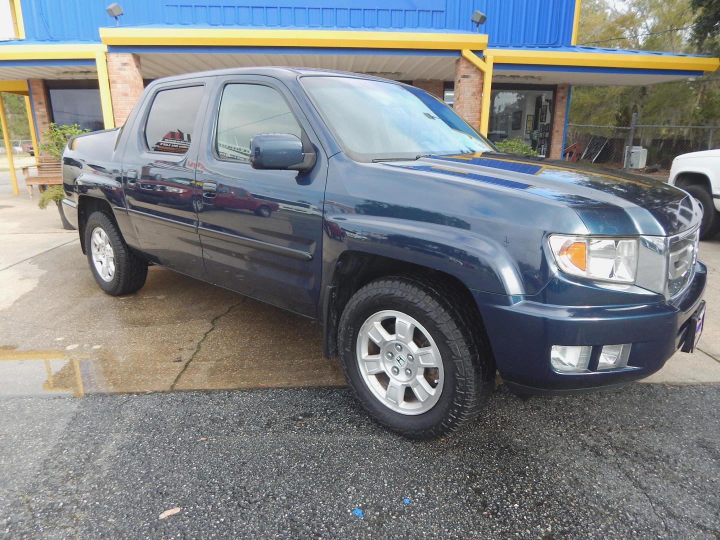 2010 Blue /Gray Honda Ridgeline RTS (5FPYK1F4XAB) with an 3.5L V6 SOHC 24V engine, Automatic transmission, located at 3120 W Tennessee St, Tallahassee, FL, 32304-1002, (850) 575-6702, 30.458841, -84.349648 - Used Car Supermarket is proud to present you with this loaded immaculate 2010 Honda Ridgeline RTS. Used Car Supermarket prides itself in offering you the finest pre-owned vehicle in Tallahassee. Used Car Supermarket has been locally family owned and operated for over 49 years. Our Encore Preferred h - Photo#0