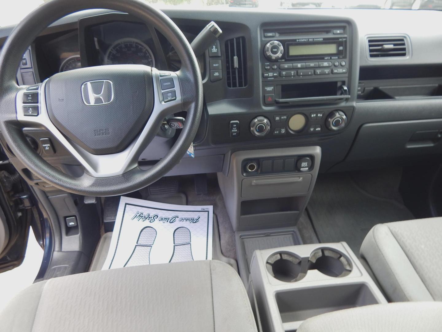 2010 Blue /Gray Honda Ridgeline RTS (5FPYK1F4XAB) with an 3.5L V6 SOHC 24V engine, Automatic transmission, located at 3120 W Tennessee St, Tallahassee, FL, 32304-1002, (850) 575-6702, 30.458841, -84.349648 - Used Car Supermarket is proud to present you with this loaded immaculate 2010 Honda Ridgeline RTS. Used Car Supermarket prides itself in offering you the finest pre-owned vehicle in Tallahassee. Used Car Supermarket has been locally family owned and operated for over 49 years. Our Encore Preferred h - Photo#5