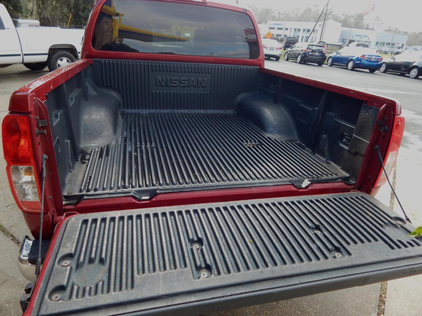 2012 Maroon /Gray Nissan Frontier S Crew Cab 2WD (1N6AD0ER8CC) with an 4.0L V6 DOHC 24V engine, Automatic transmission, located at 3120 W Tennessee St, Tallahassee, FL, 32304-1002, (850) 575-6702, 30.458841, -84.349648 - Used Car Supermarket is proud to present you with this loaded immaculate 2012 Nissan Frontier S Crew Cab. Used Car Supermarket prides itself in offering you the finest pre-owned vehicle in Tallahassee. Used Car Supermarket has been locally family owned and operated for over 49 years. Our Frontier Cr - Photo#3