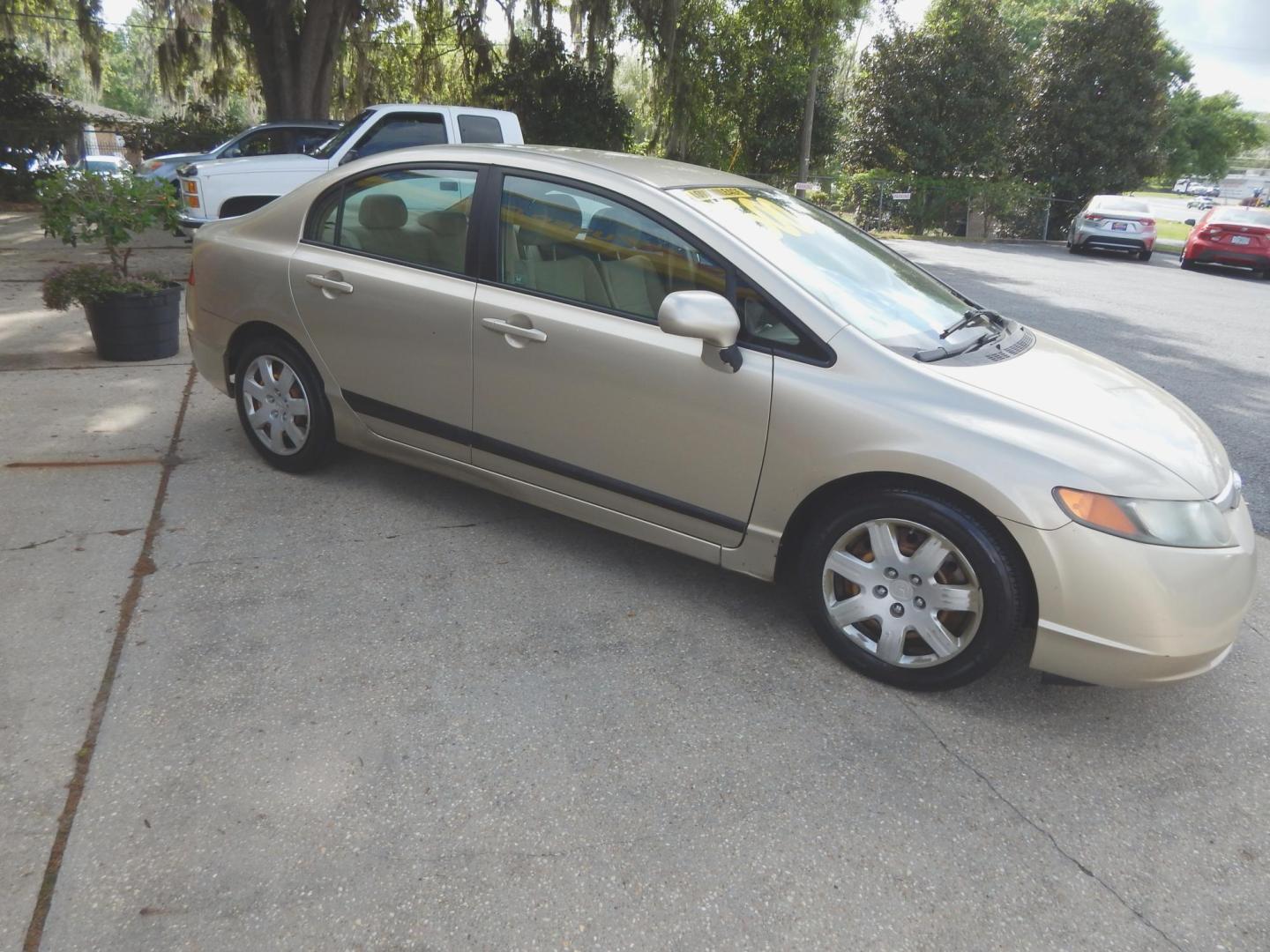 2008 Champagne /Tan Honda Civic LX Sedan AT (1HGFA16508L) with an 1.8L L4 SOHC 16V engine, Automatic transmission, located at 3120 W Tennessee St, Tallahassee, FL, 32304-1002, (850) 575-6702, 30.458841, -84.349648 - Used Car Supermarket is proud to present you with this loaded immaculate 2008 Honda Civic LX sedan with low miles. Used Car Supermarket prides itself in offering you the finest pre-owned vehicle in Tallahassee. Used Car Supermarket has been locally family owned and operated for over 49 years. Our Ci - Photo#1