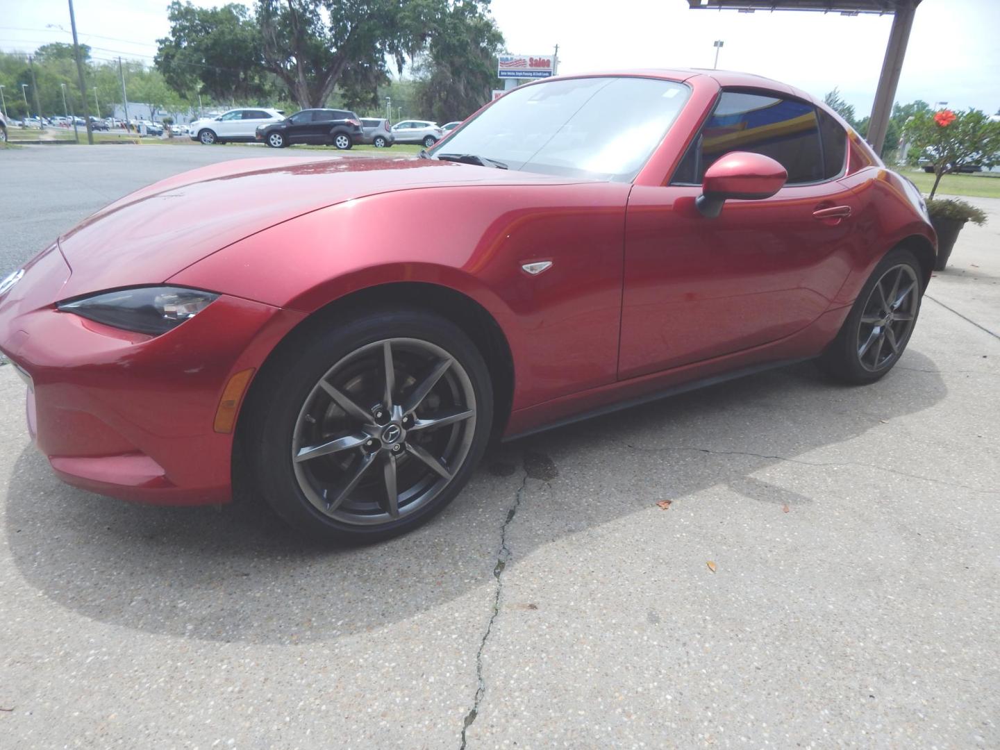 2018 Maroon /Charcoal Leather Mazda MX-5 Miata RF Grand Touring 6MT (JM1NDAM78J0) with an 2.0L L4 DOHC 16V engine, 6M transmission, located at 3120 W Tennessee St, Tallahassee, FL, 32304-1002, (850) 575-6702, 30.458841, -84.349648 - Used Car Supermarket is proud to present you with this loaded immaculate 2018 Mazda MX-5 Miata Grand Touring Hardtop Convertible with leather and Navigation. Used Car Supermarket prides itself in offering you the finest pre-owned vehicle in Tallahassee. Used Car Supermarket has been locally family o - Photo#1